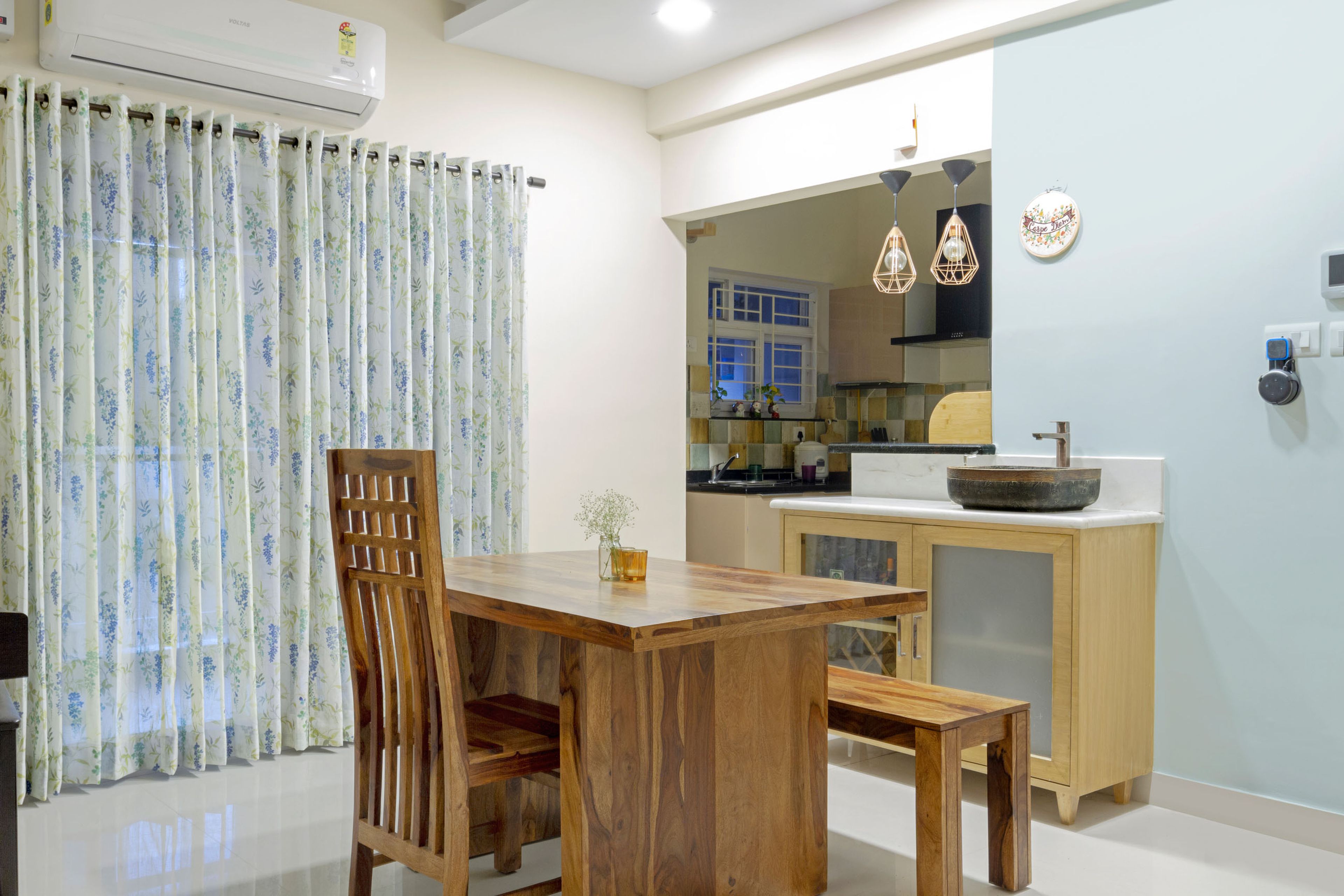 2-Seater Dining Room With A Wooden Crockery Unit - Livspace
