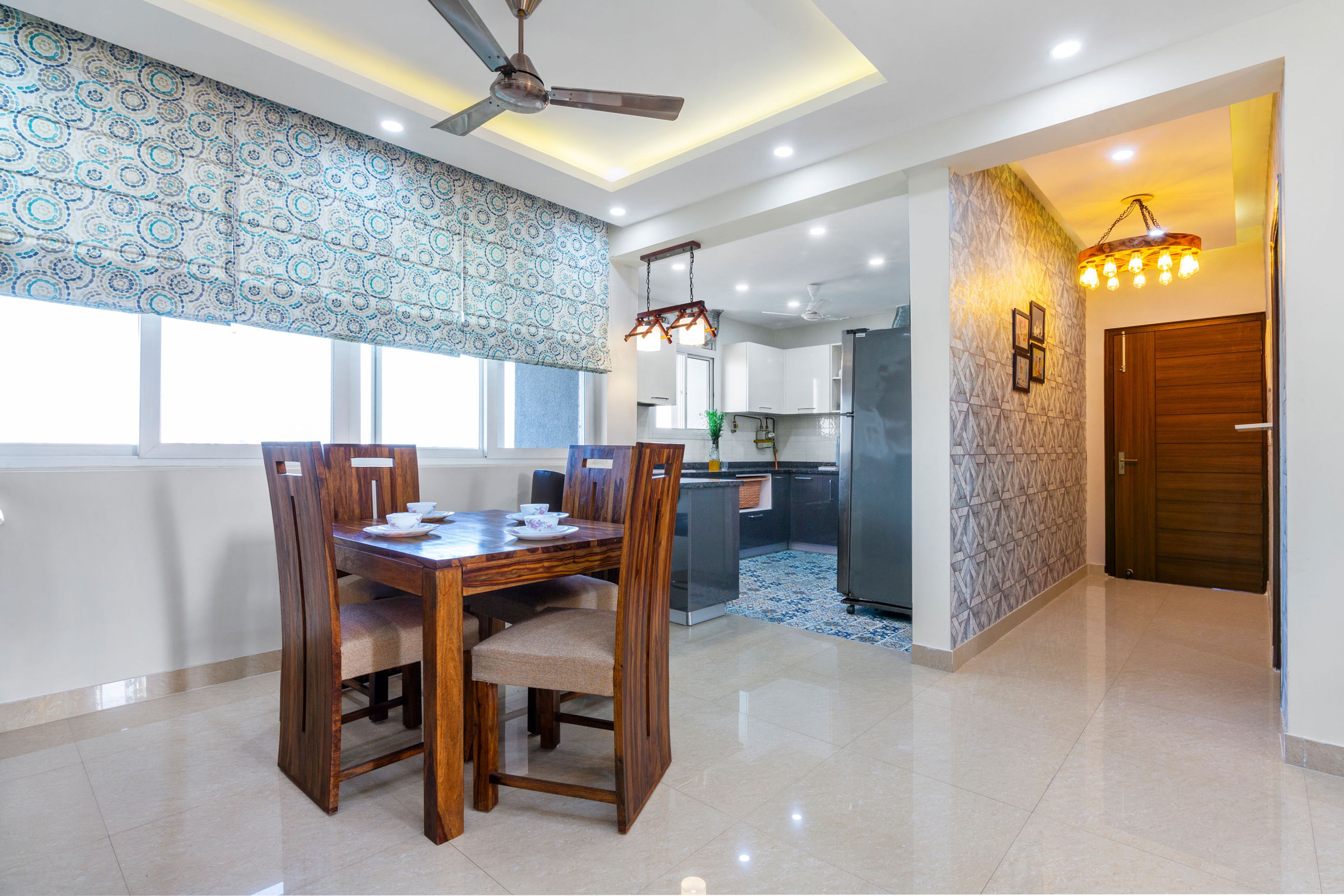 4-Seater Dining Room With White Walls And Flooring - Livspace