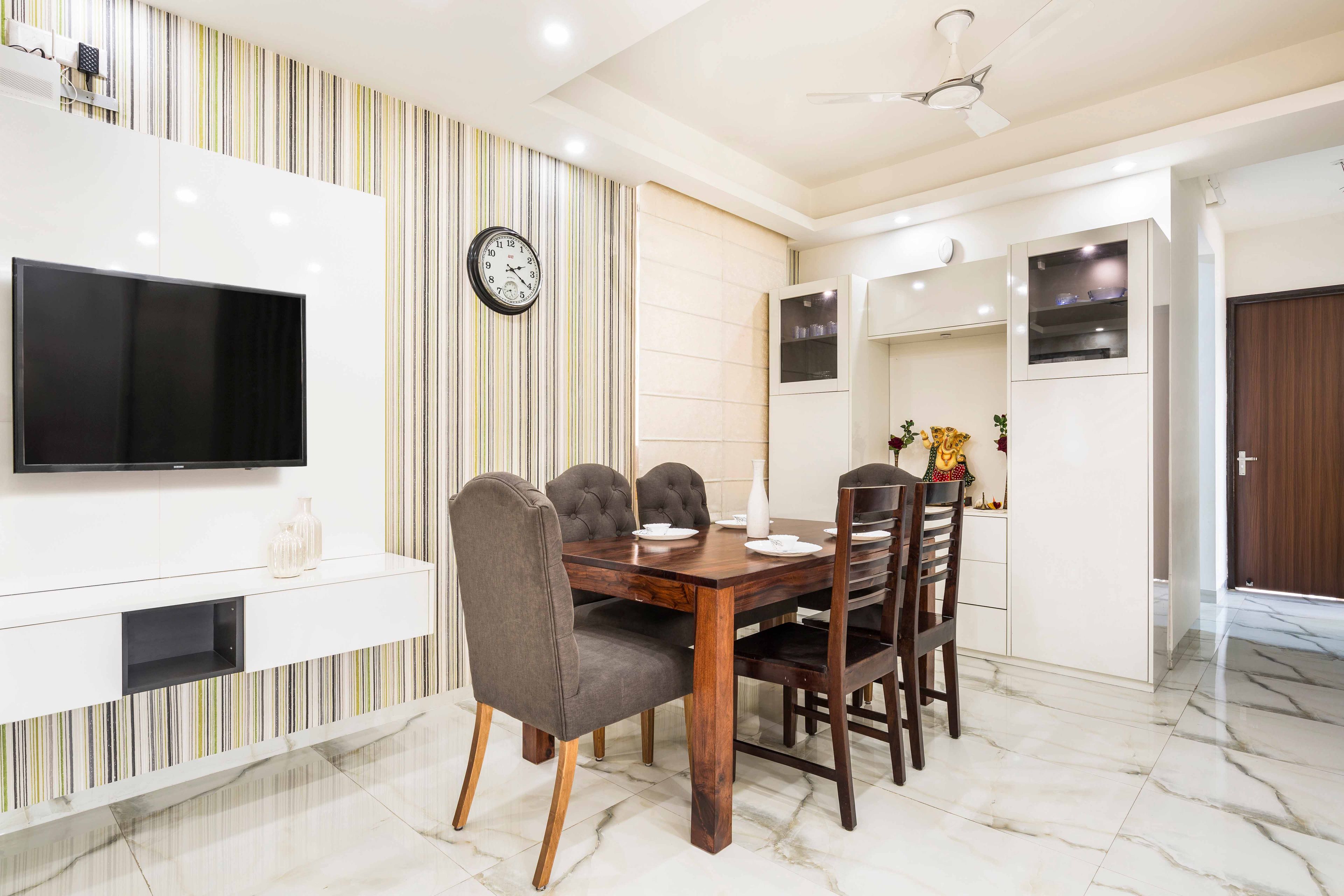 6-Seater Dining Room With An Integrated White TV Unit - Livspace