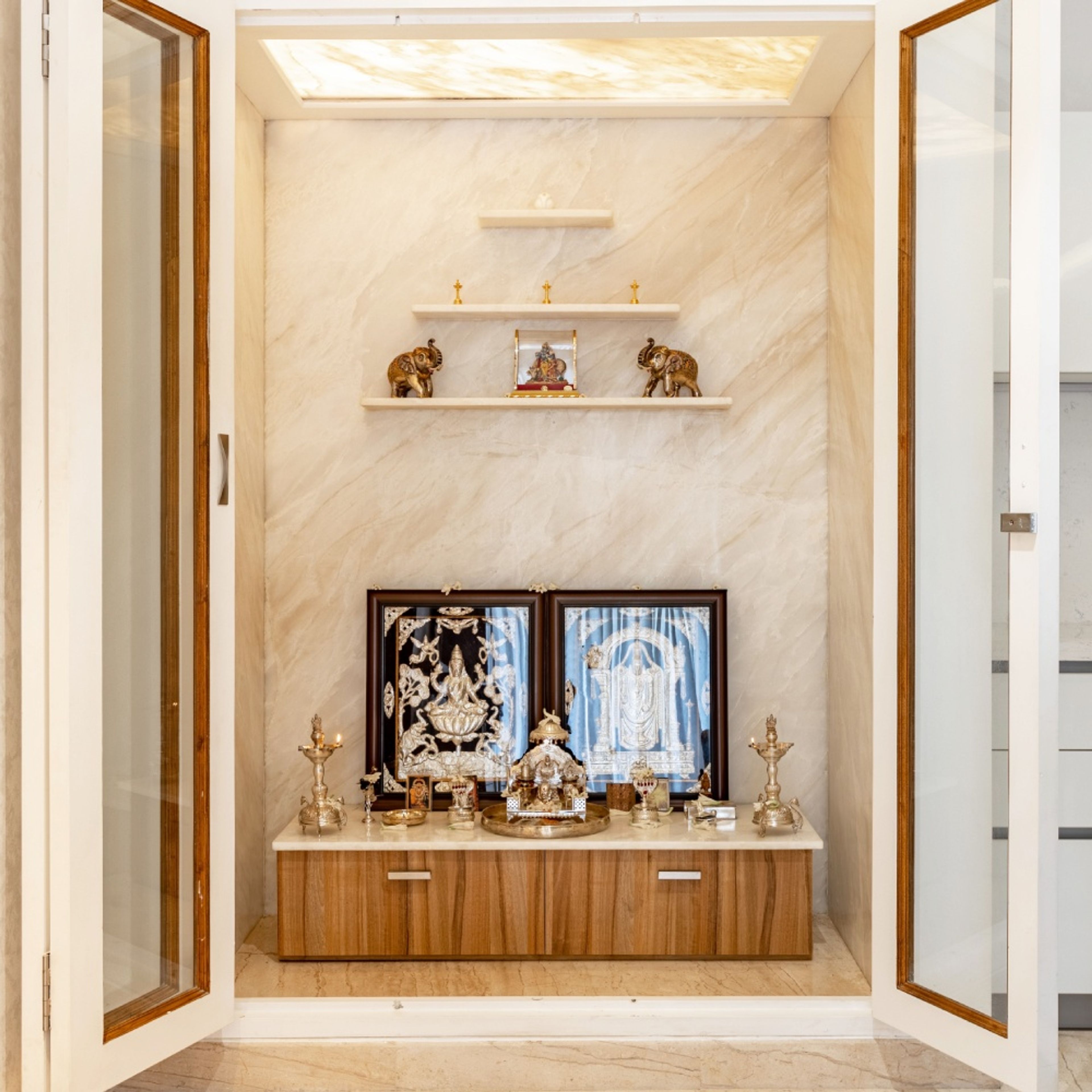 Contemporary Mandir Design With Tahiti Samoa Teak Laminates And Storage Unit