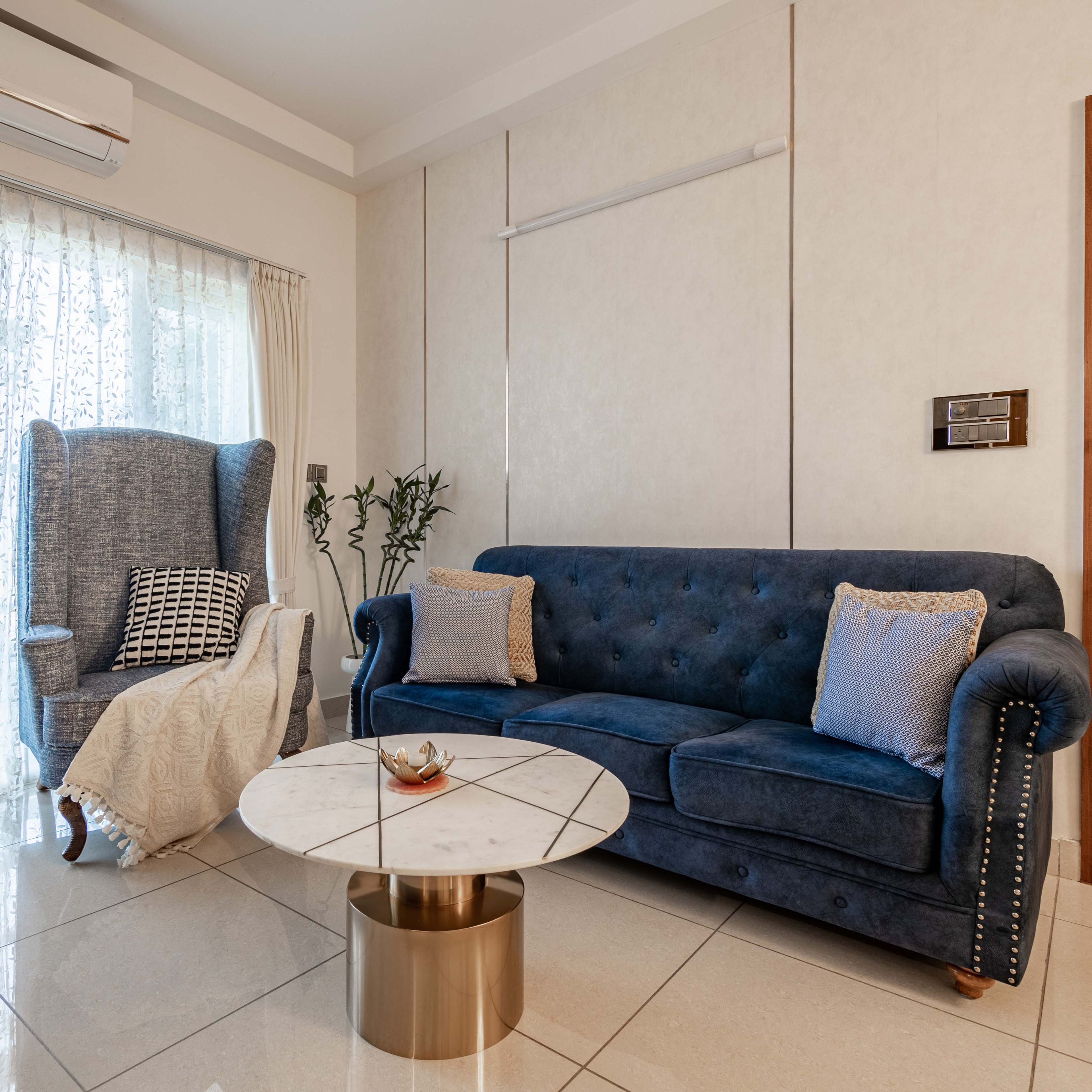 Beige And Gold Textured Living Room Wall Design With Inlays - Livspace