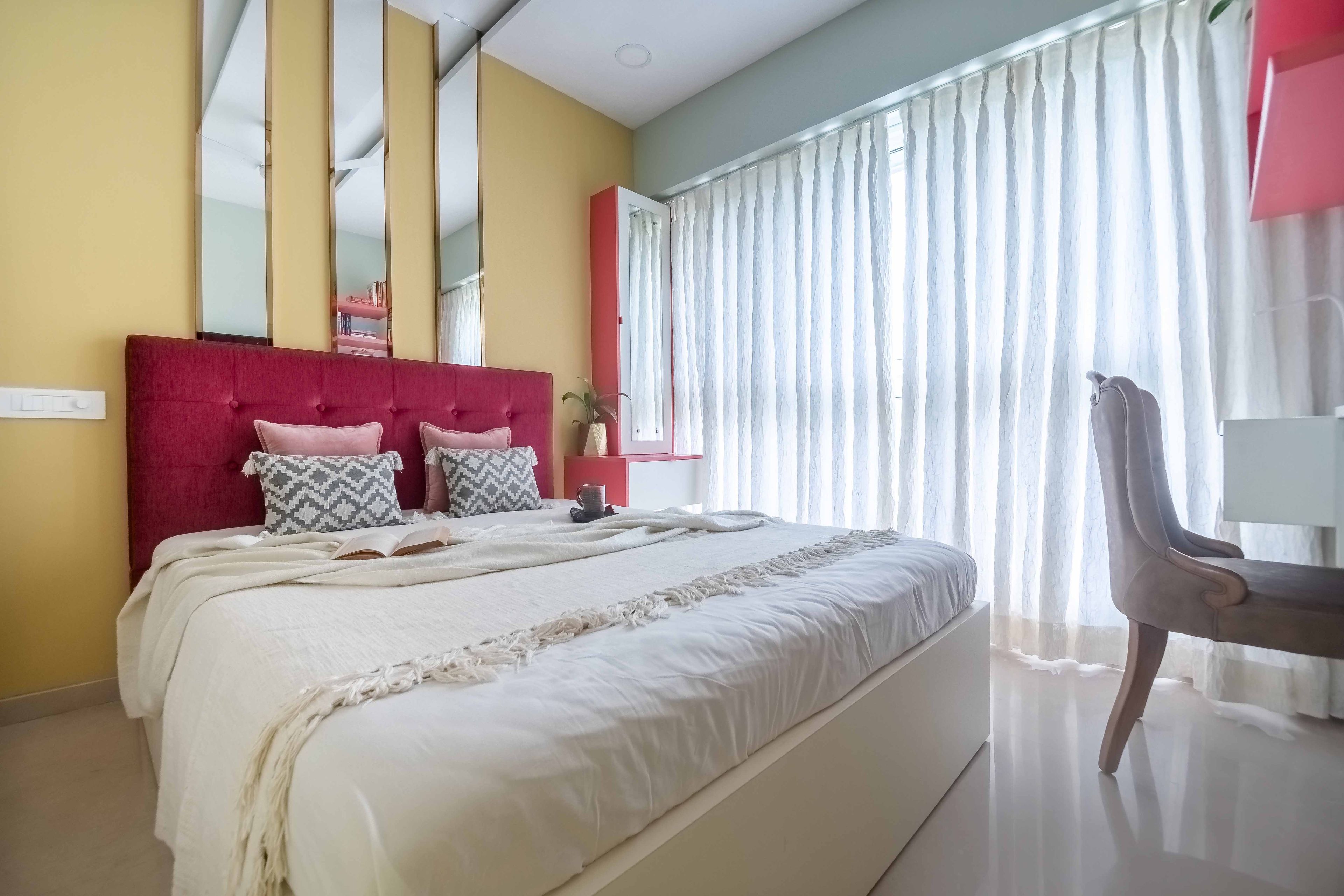 Yellow Bedroom Wall Design With Mirrored Panels - Livspace