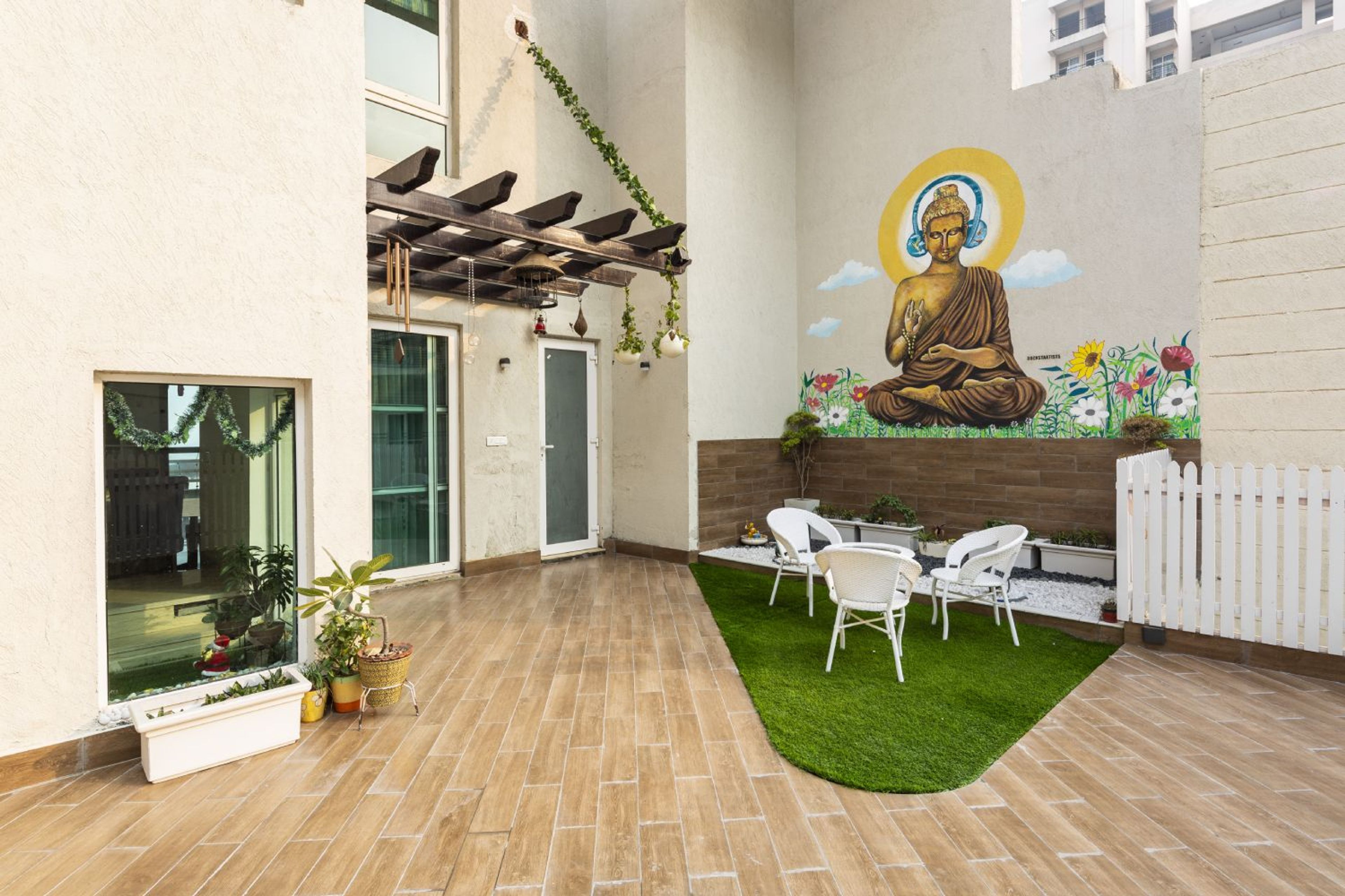 Balcony Design with Buddha Wallpaper - Livspace