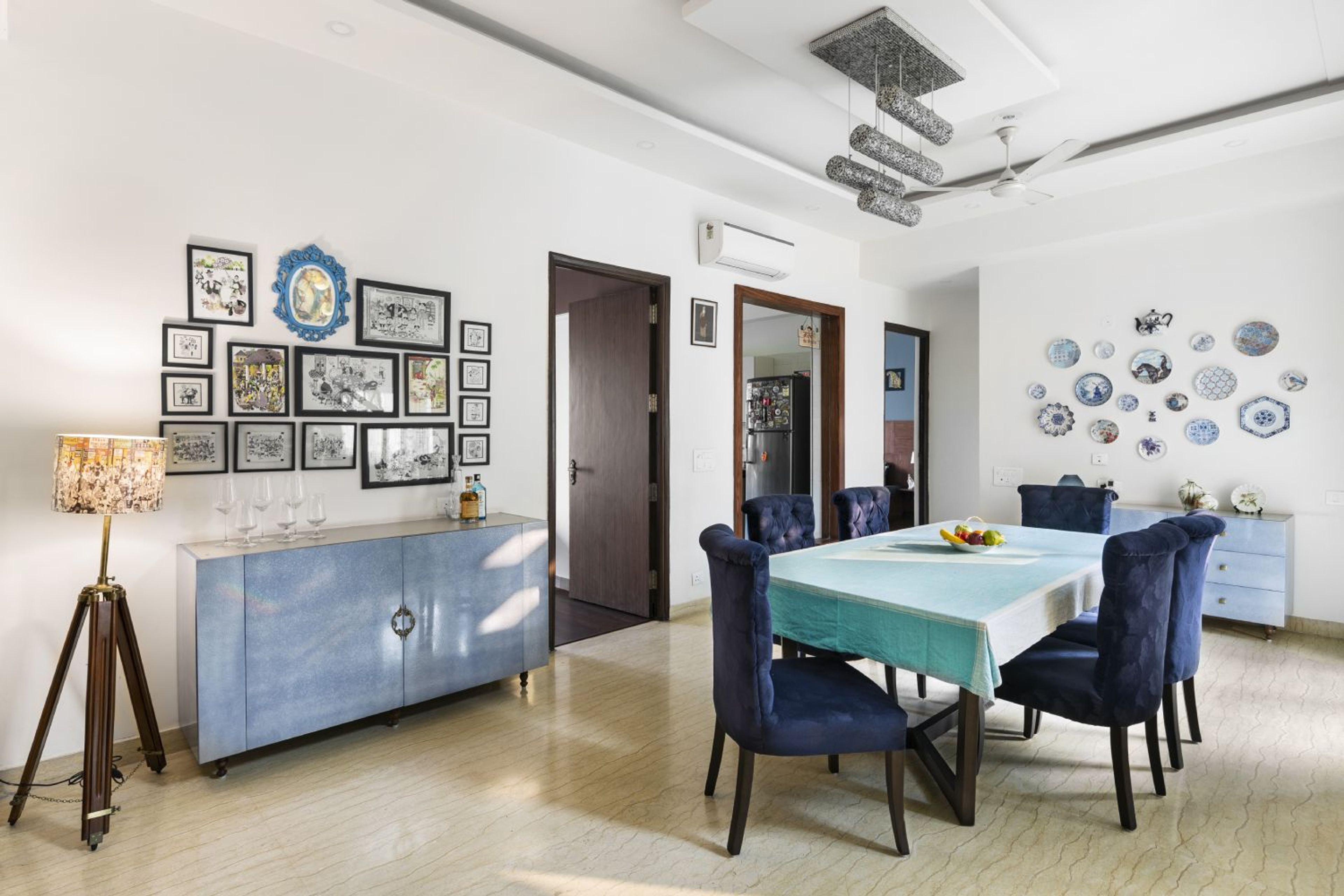 6-Seater Dining Room Design with Blue Chairs