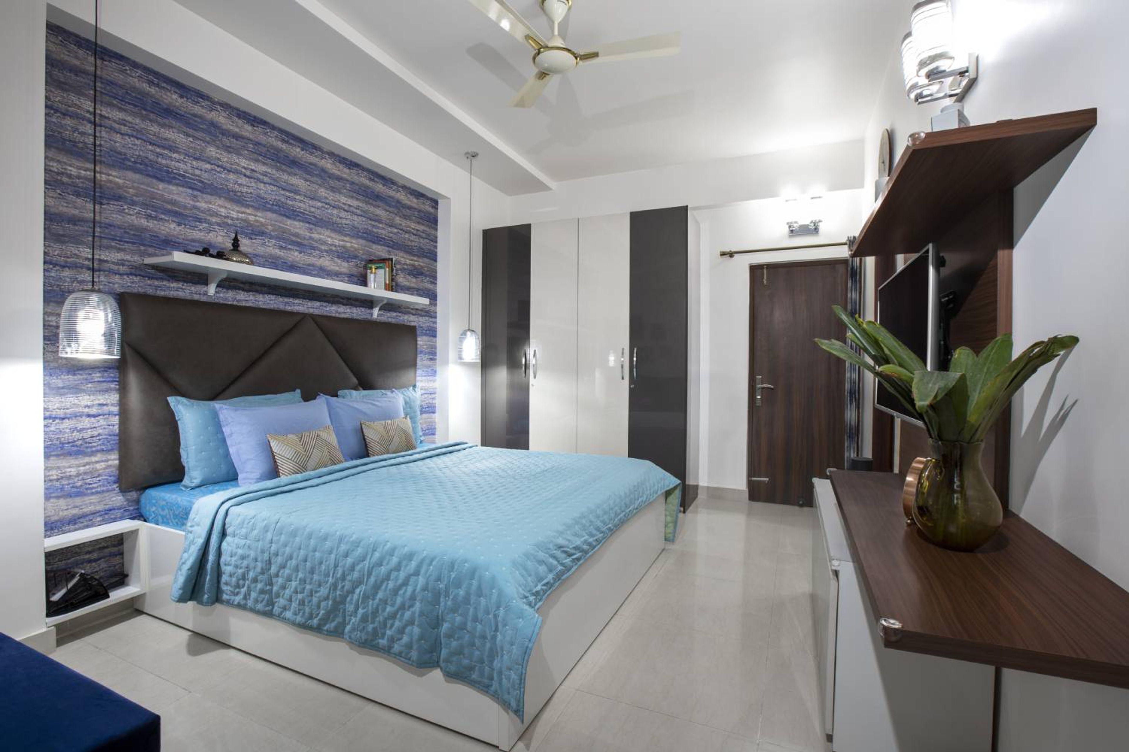 Master Bedroom Design with Blue Patterned Wallpaper