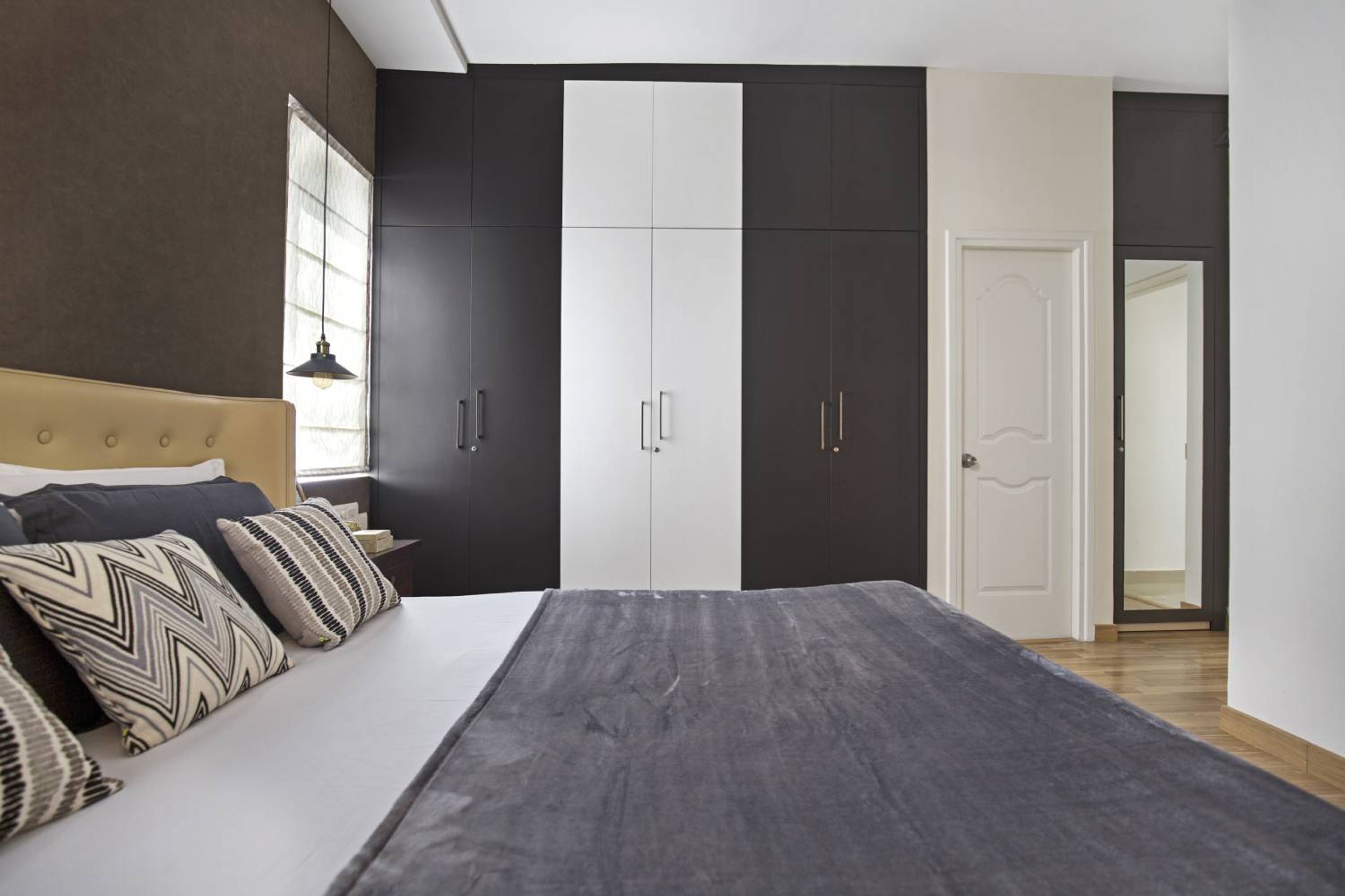 Master bedroom Design with 6-Door Swing Wardrobe