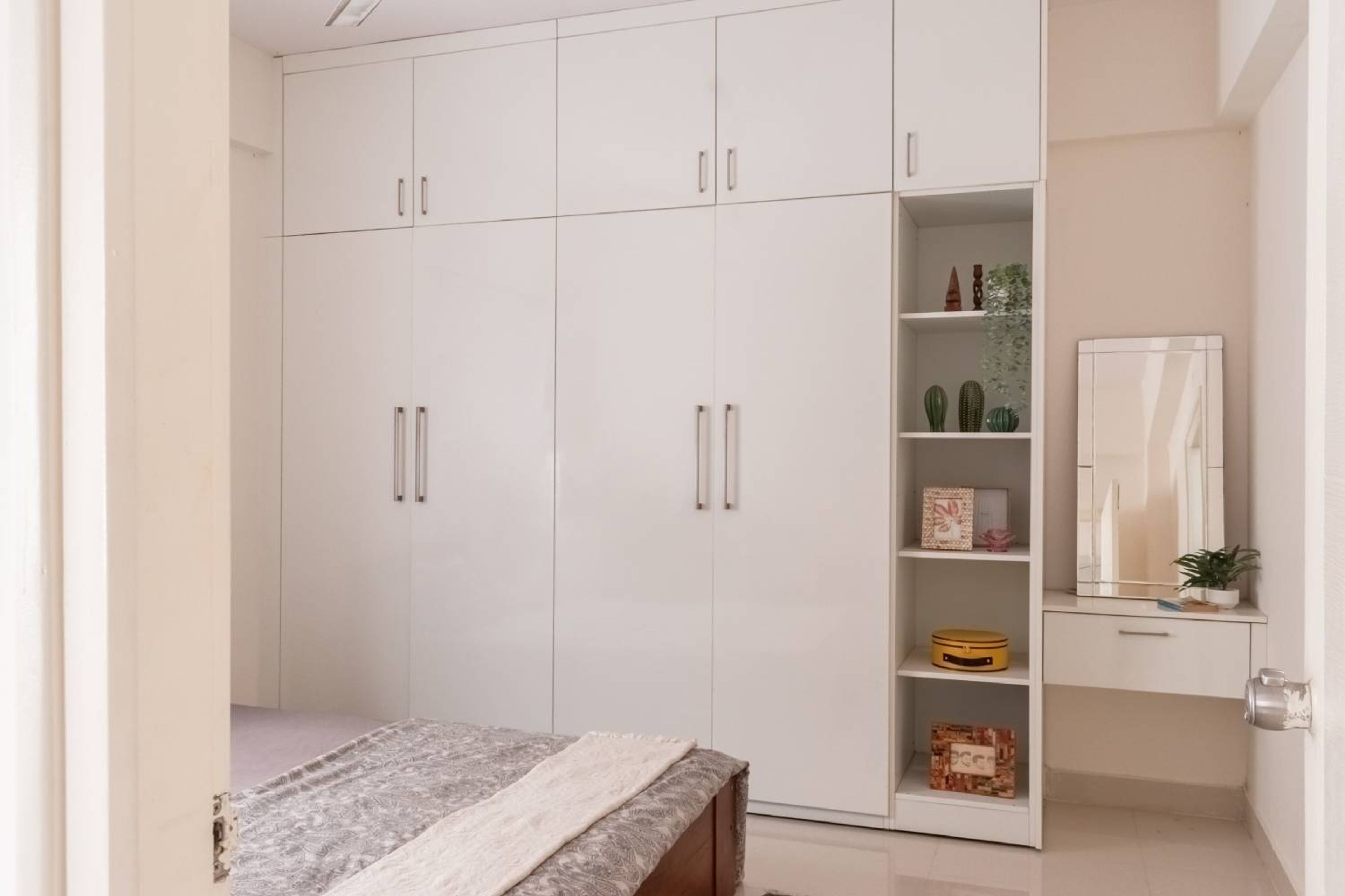 Master Bedroom Design with White 4-Door Swing Wardrobe