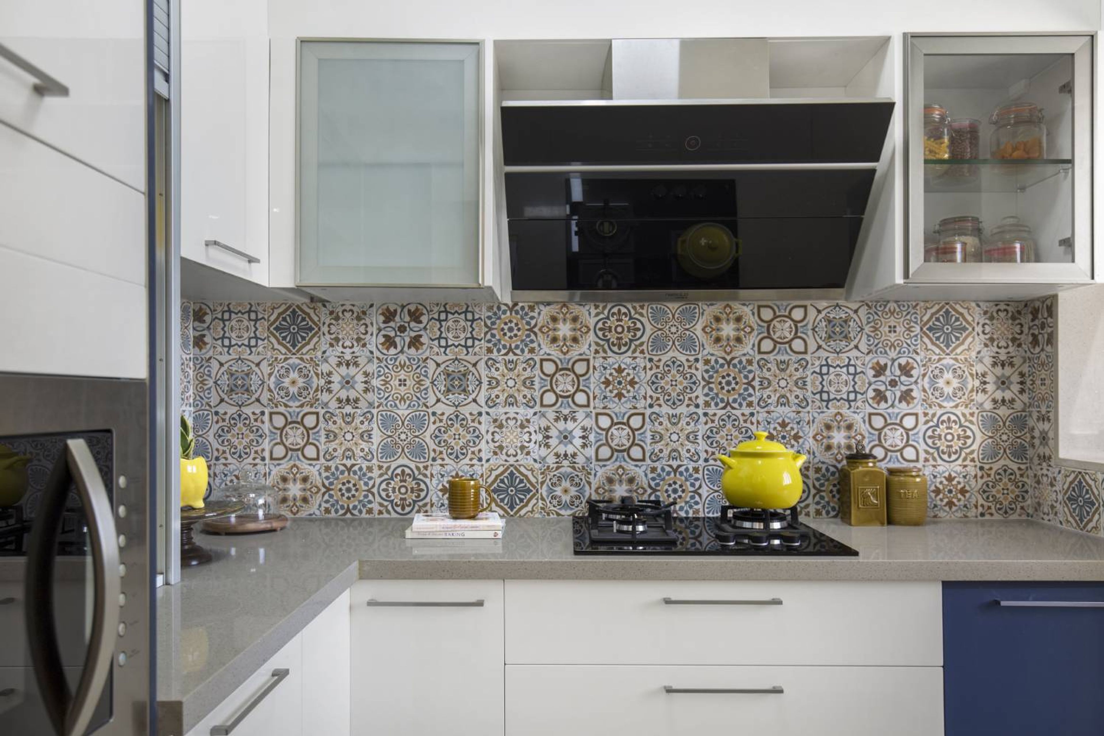 Contemporary 1BHK Flat Design with L-Shaped Kitchen and Stylish Dining Area