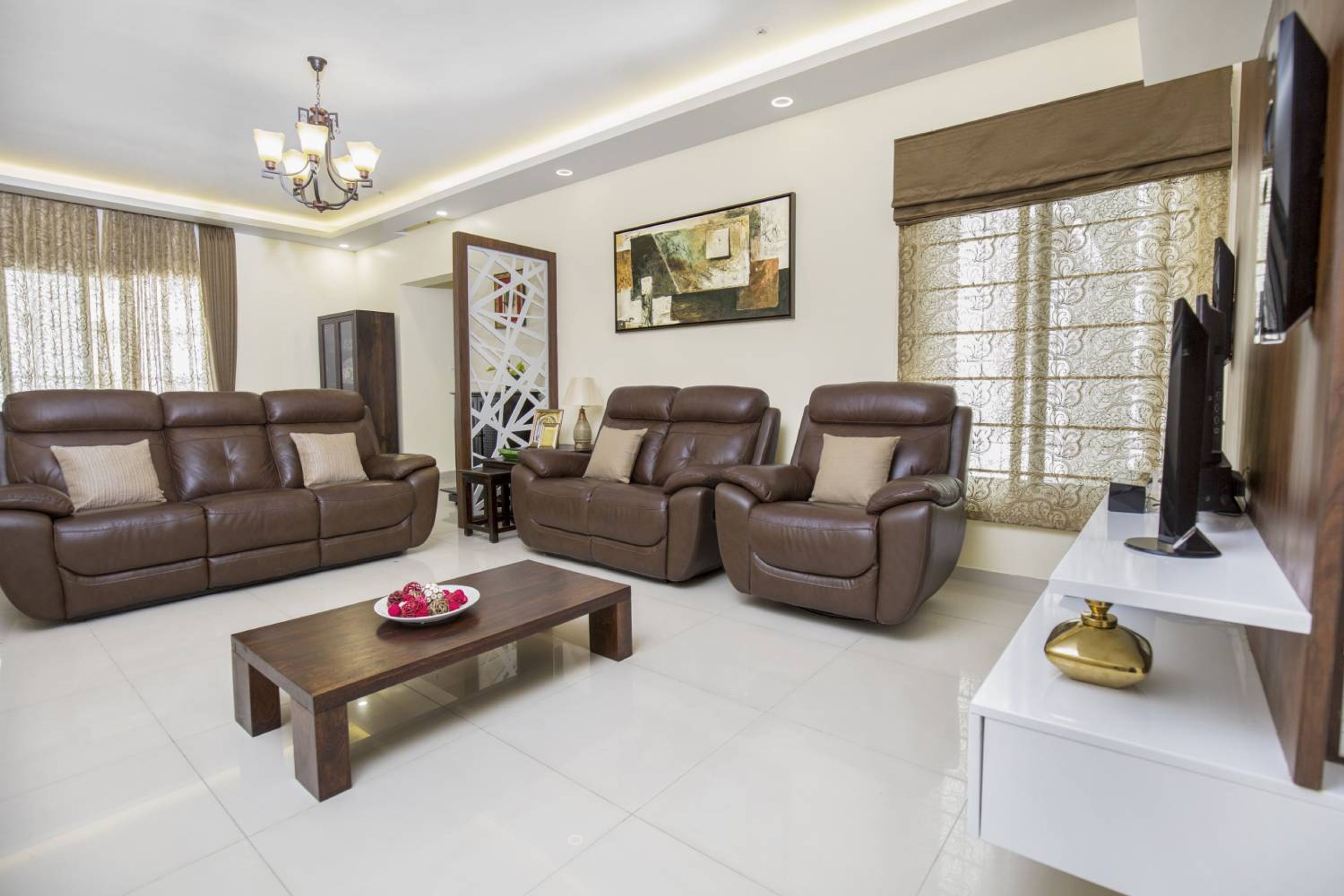 Living Room Design with Brown Leather Sofas