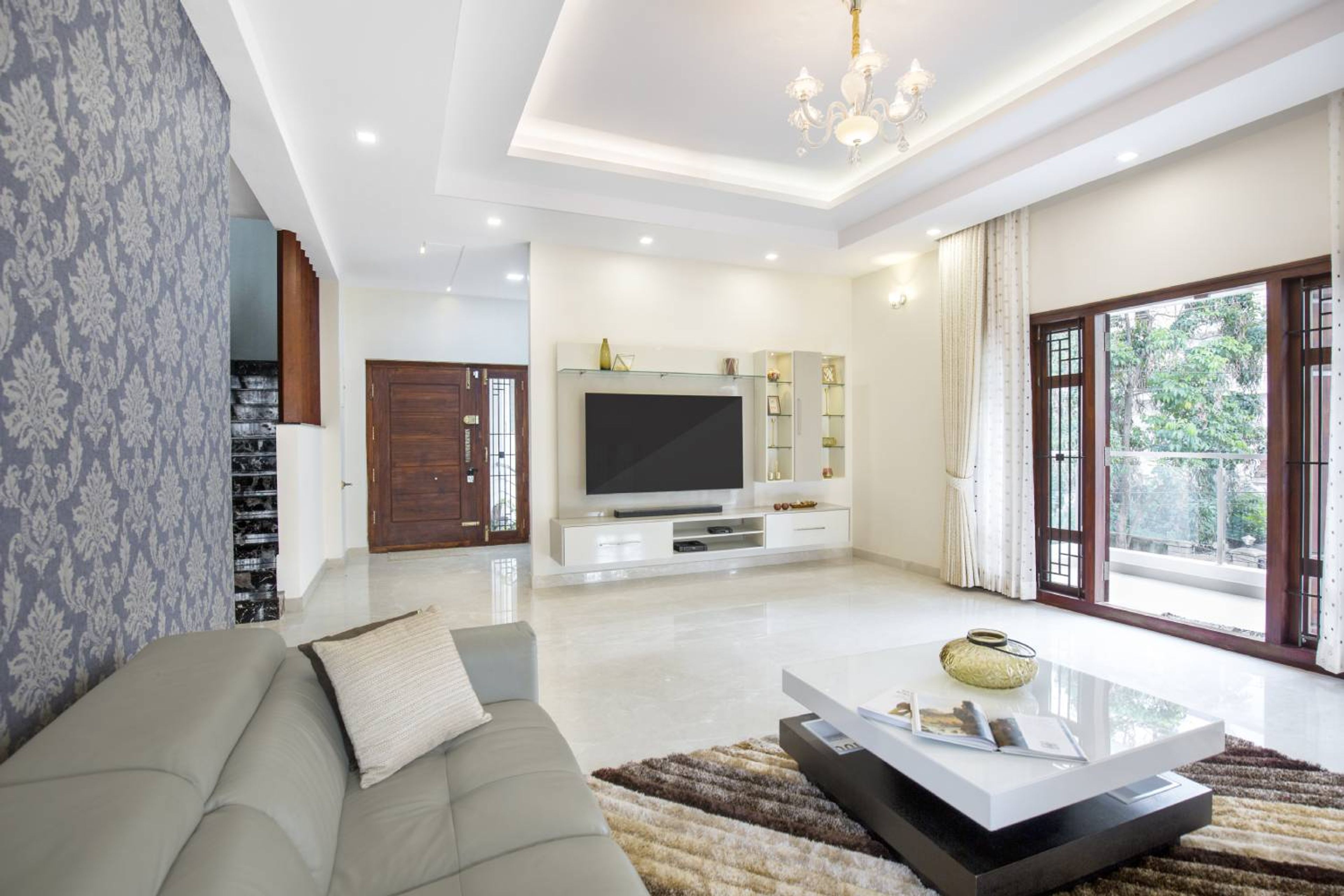 Living Room Design with Glass Shelf TV Unit