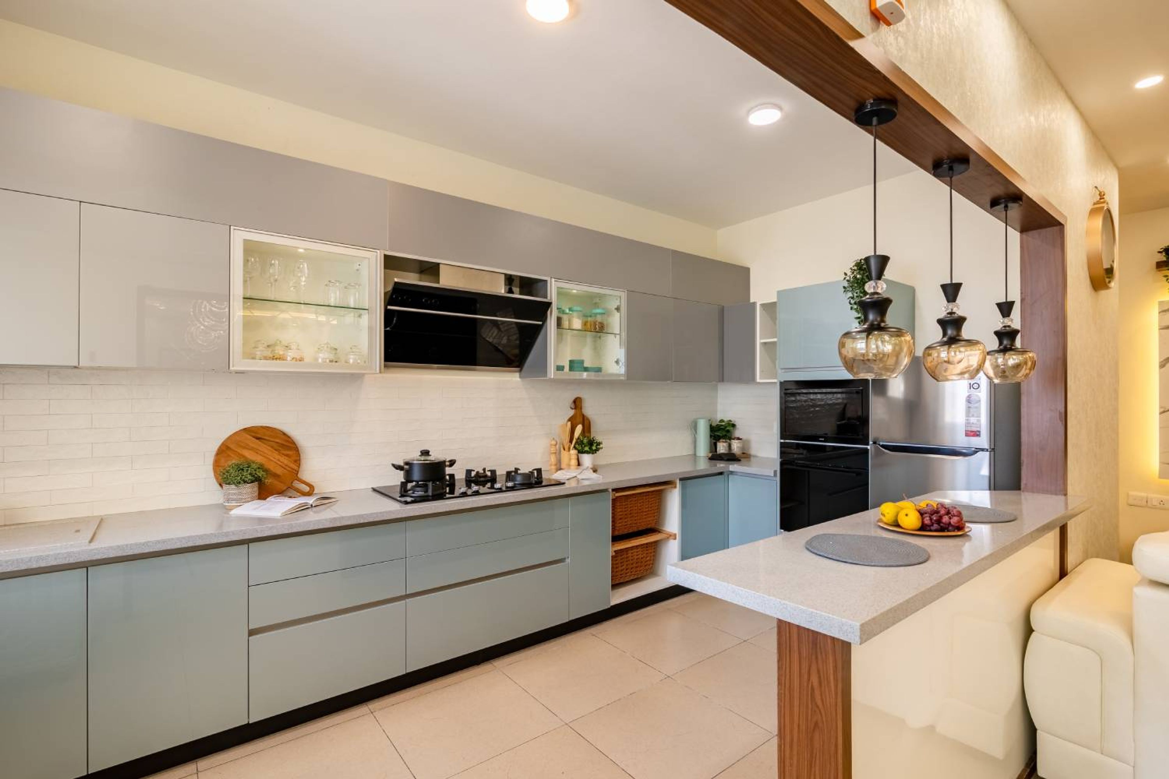 2BHK Contemporary Flat Design with Pastel Kitchen and Mirror Dining Area