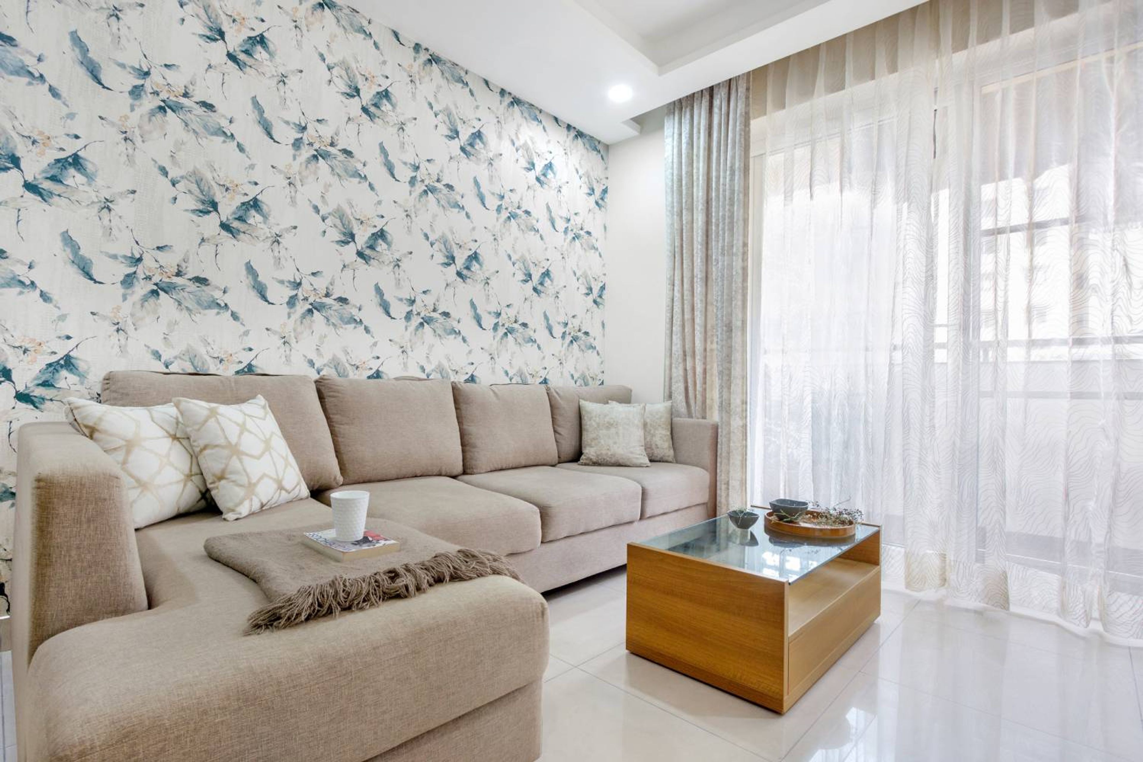 Living Room Design with L-Shaped Beige Sofa