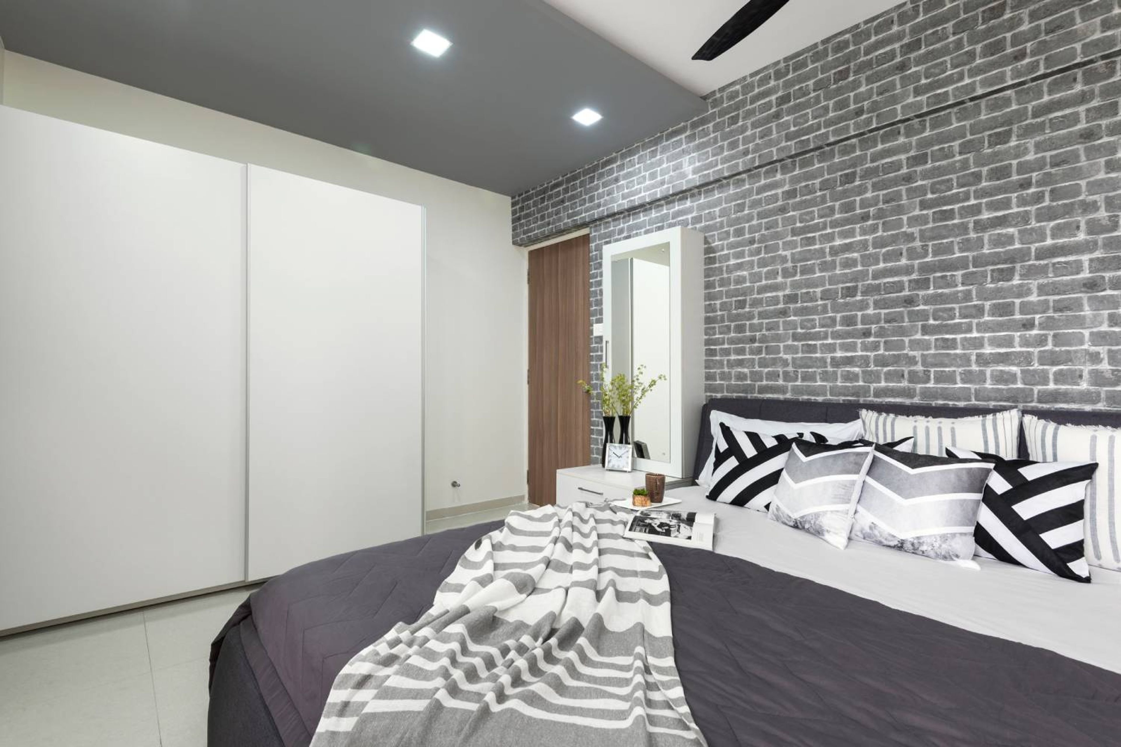 Master bedroom Design with Grey Brick Wall Accent