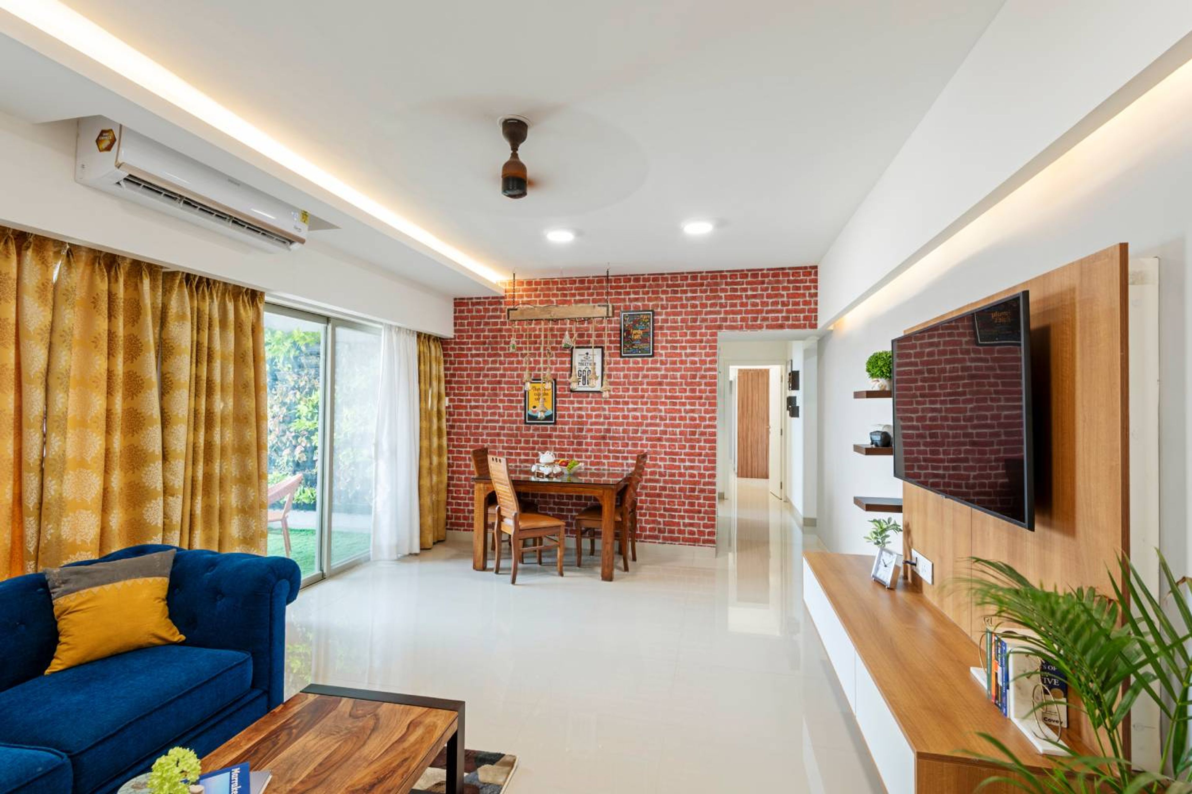 6-Seater Living-Cum-Dining Room Design with Brick Wall