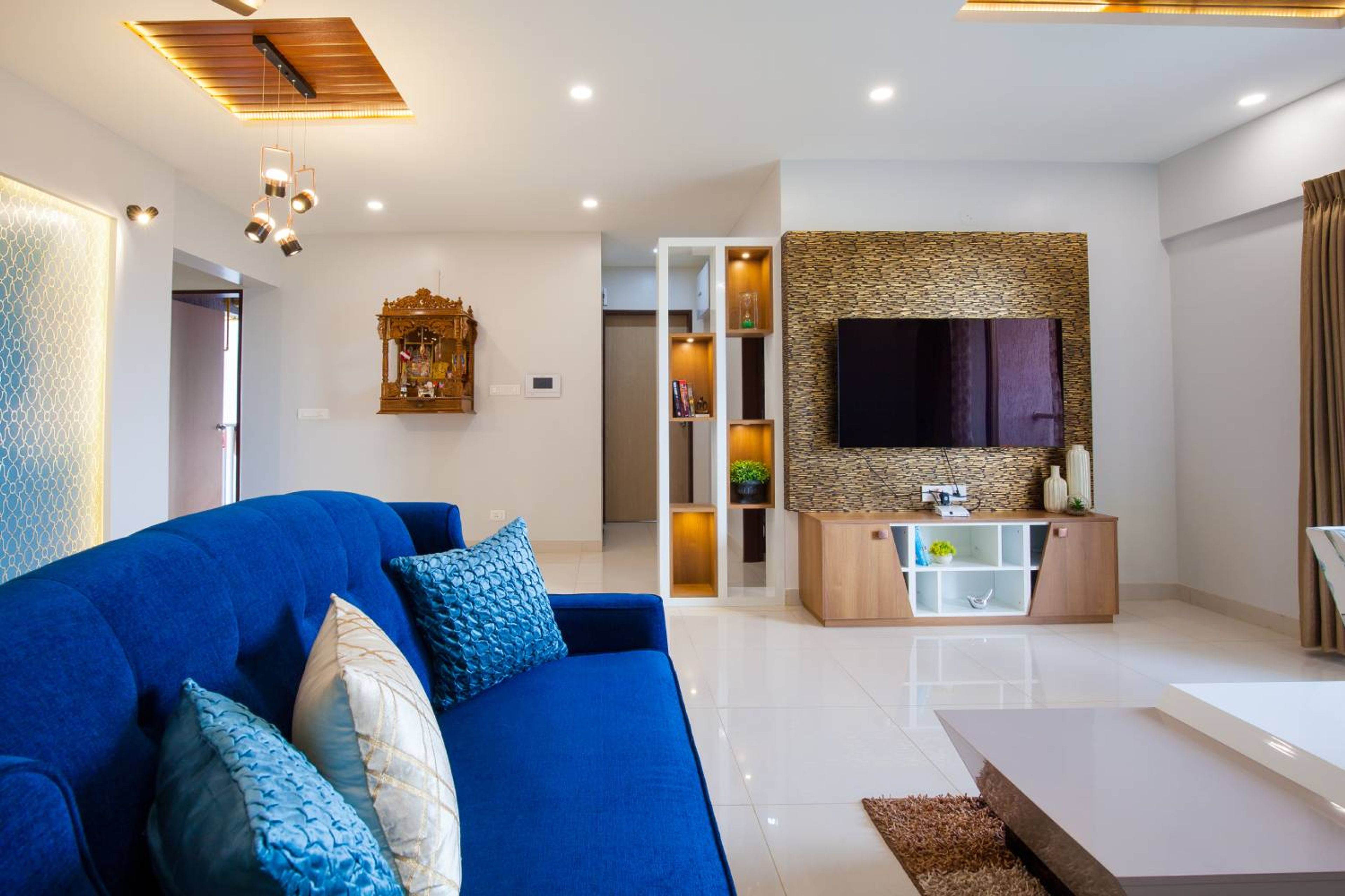 Living Room Design with Wall Pooja Unit