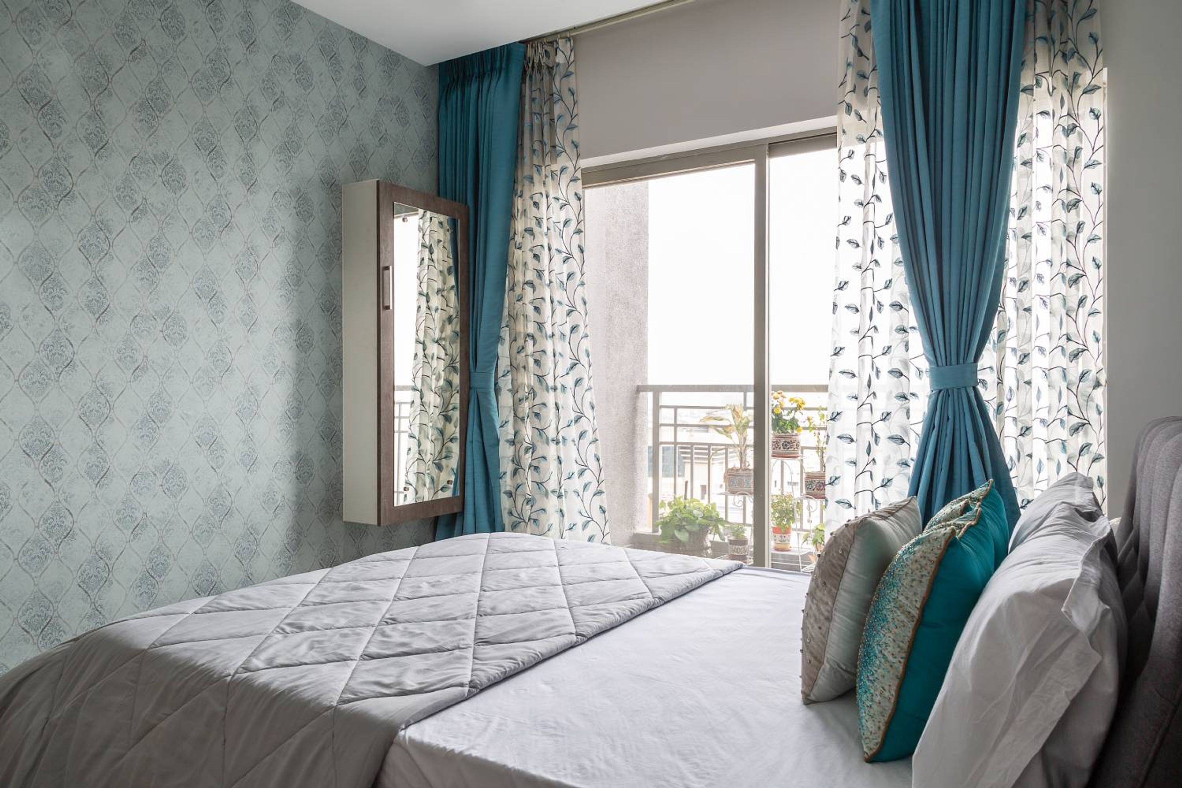 Guest Bedroom Design with Blue Patterned Wallpaper
