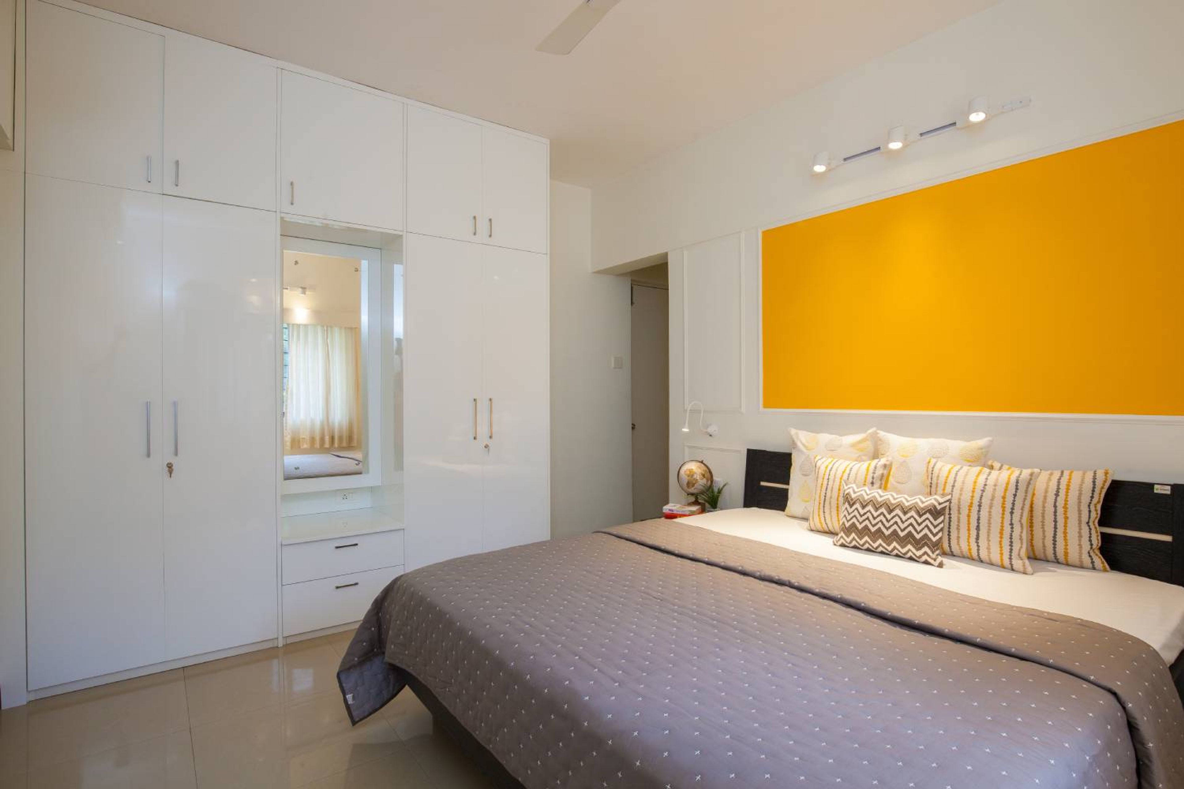 Master Bedroom Design with Yellow Accent Wall