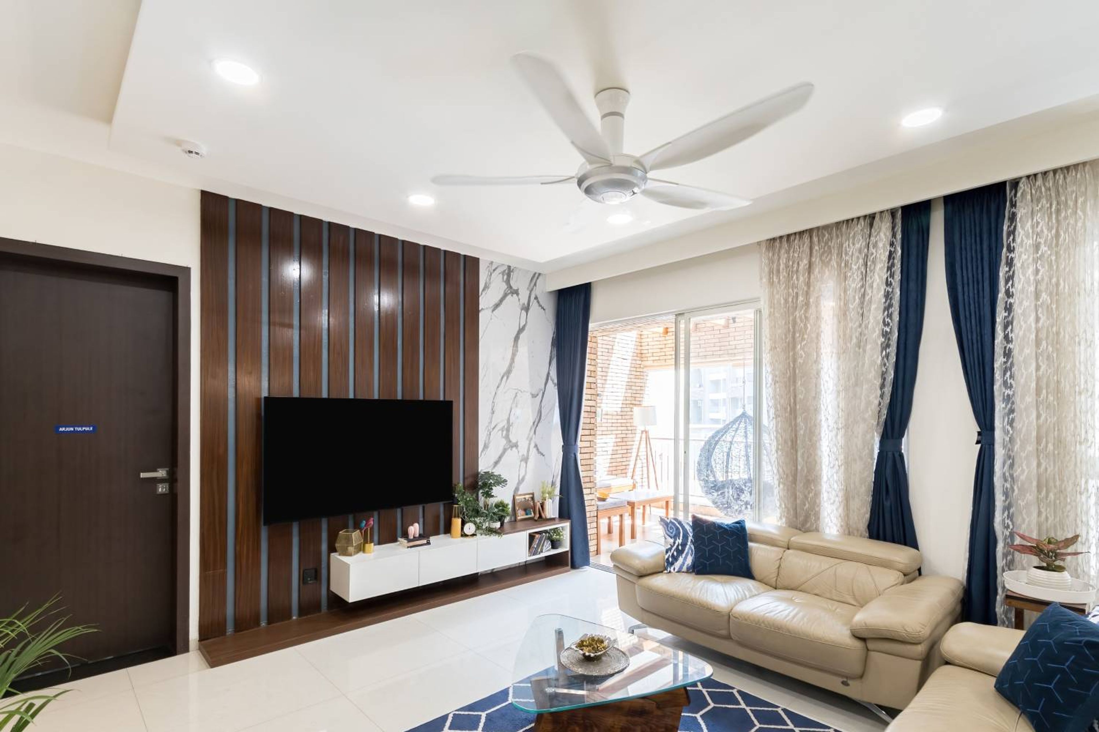 Living Room Design with Wooden TV Unit