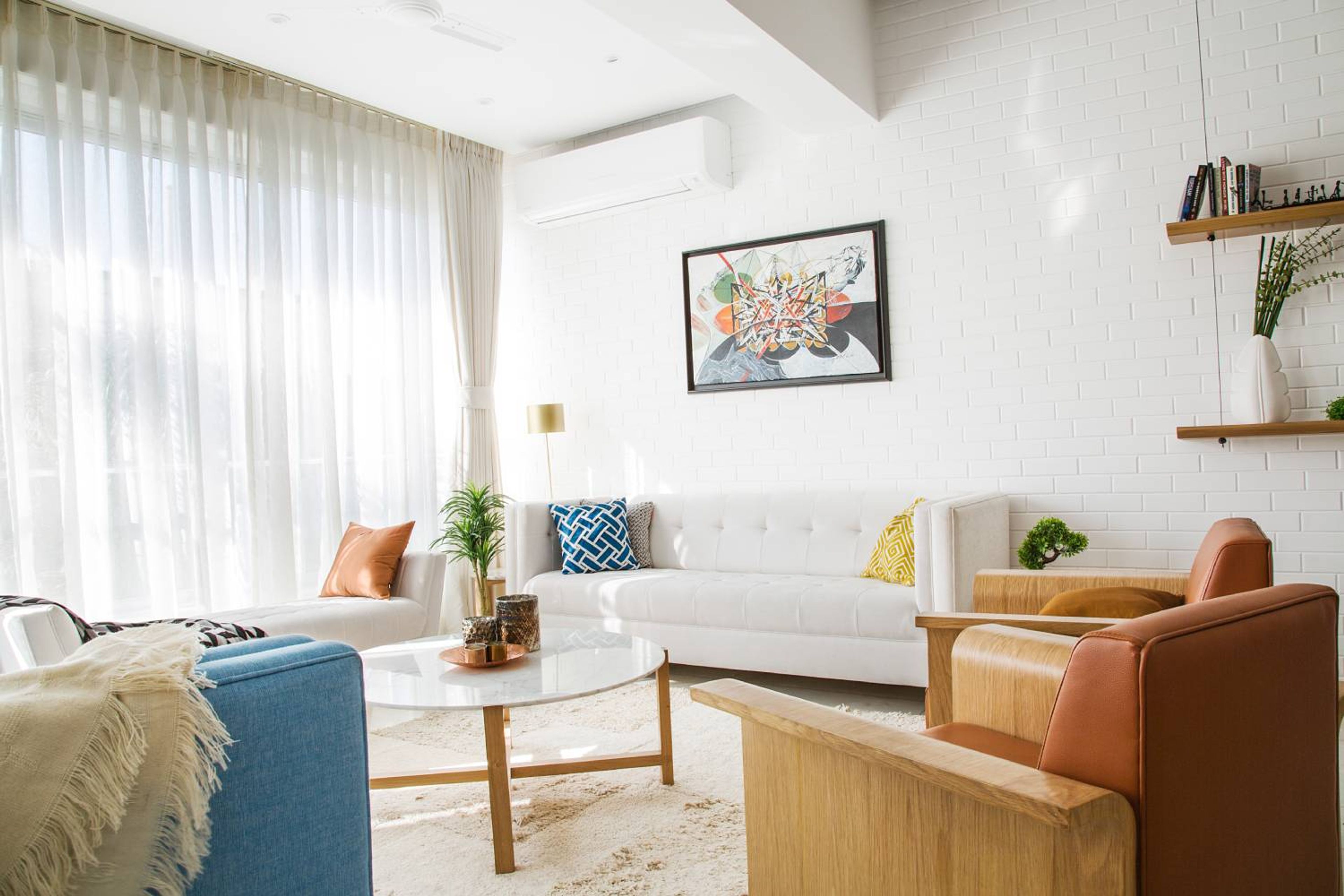 White Living Room Design with White Leather Sofa