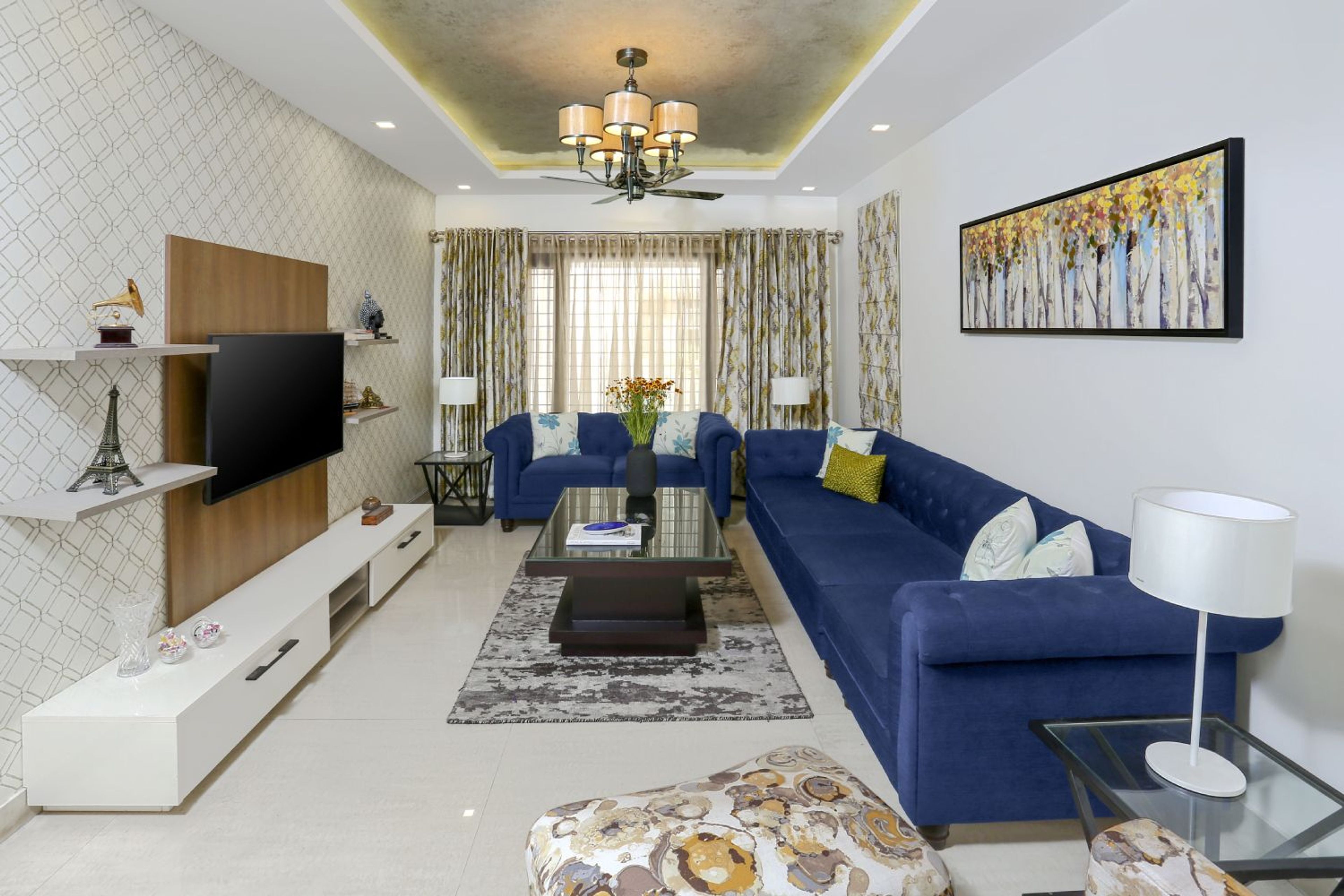 Contemporary 3BHK Flat Interior Design with TV Backdrop and Glass Dining Area