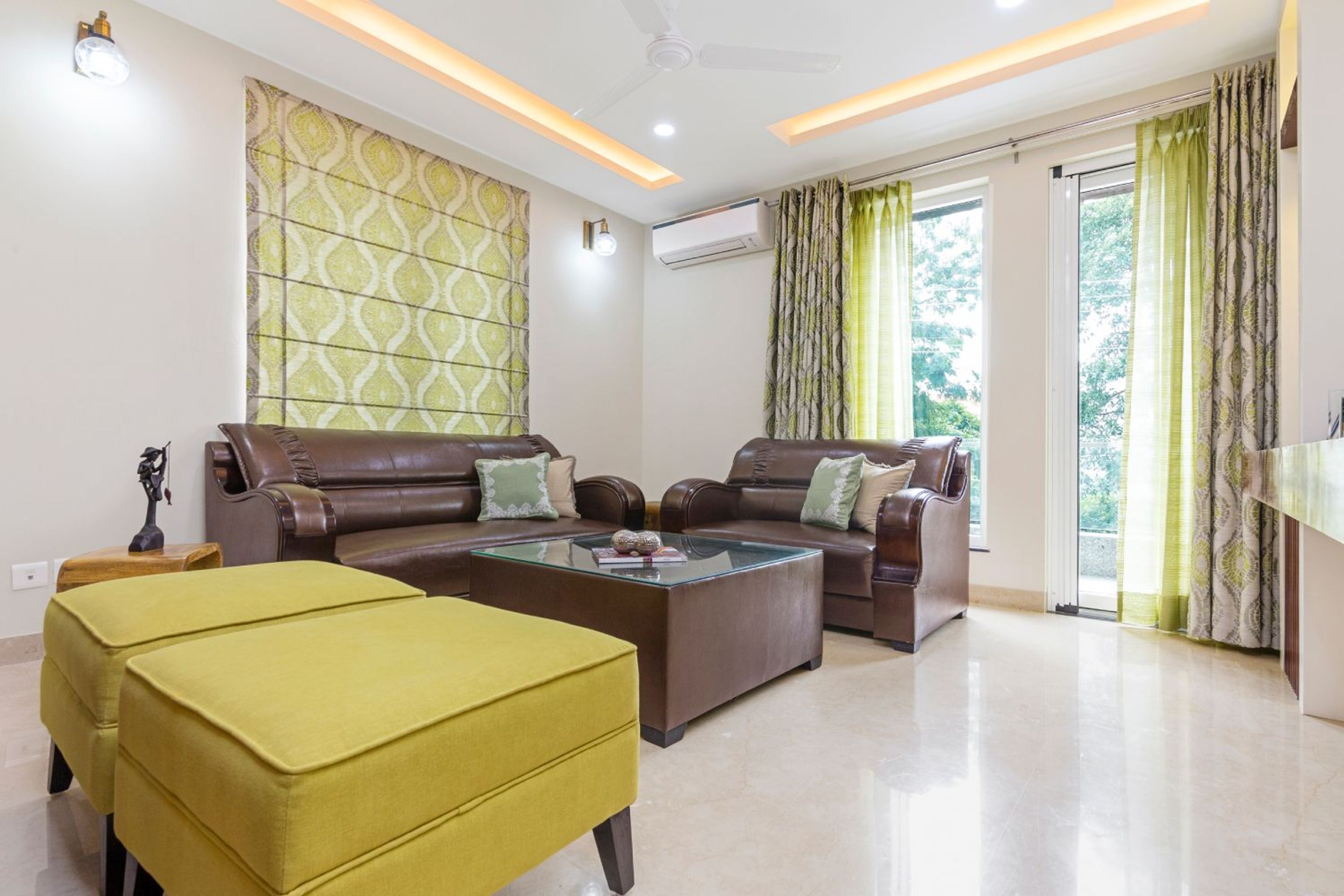 Living Room Design with Brown Leather Sofa