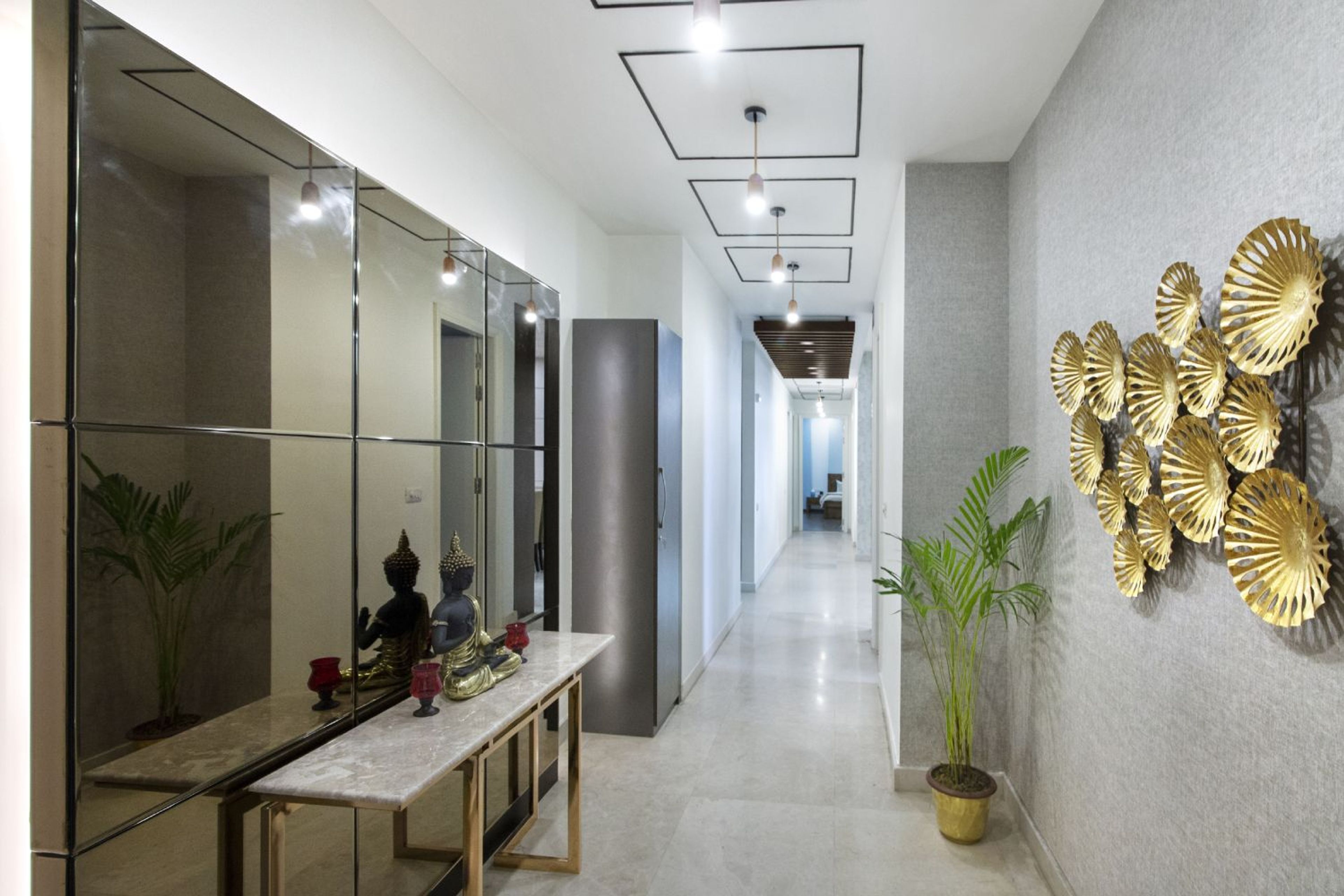 Foyer Design with Golden Artwork
