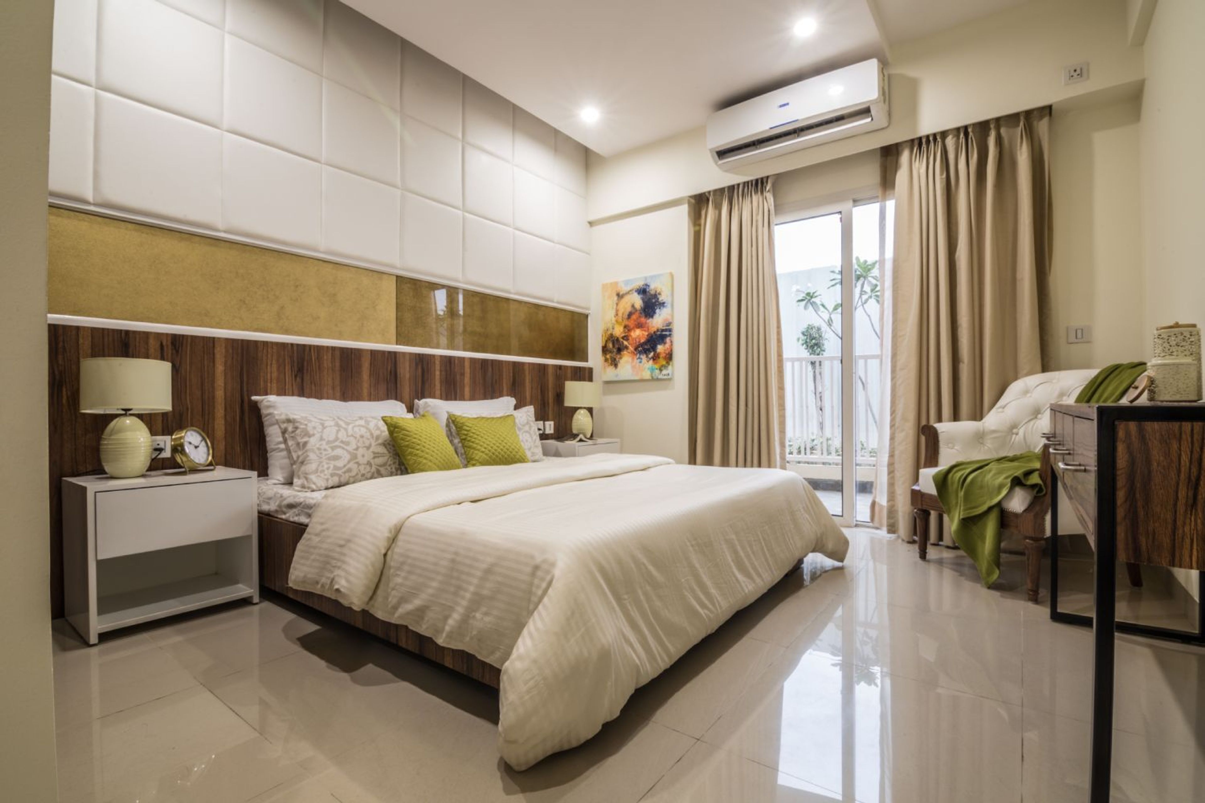 Master Bedroom Design with Cushioned Wall and Wooden Headboard Bed