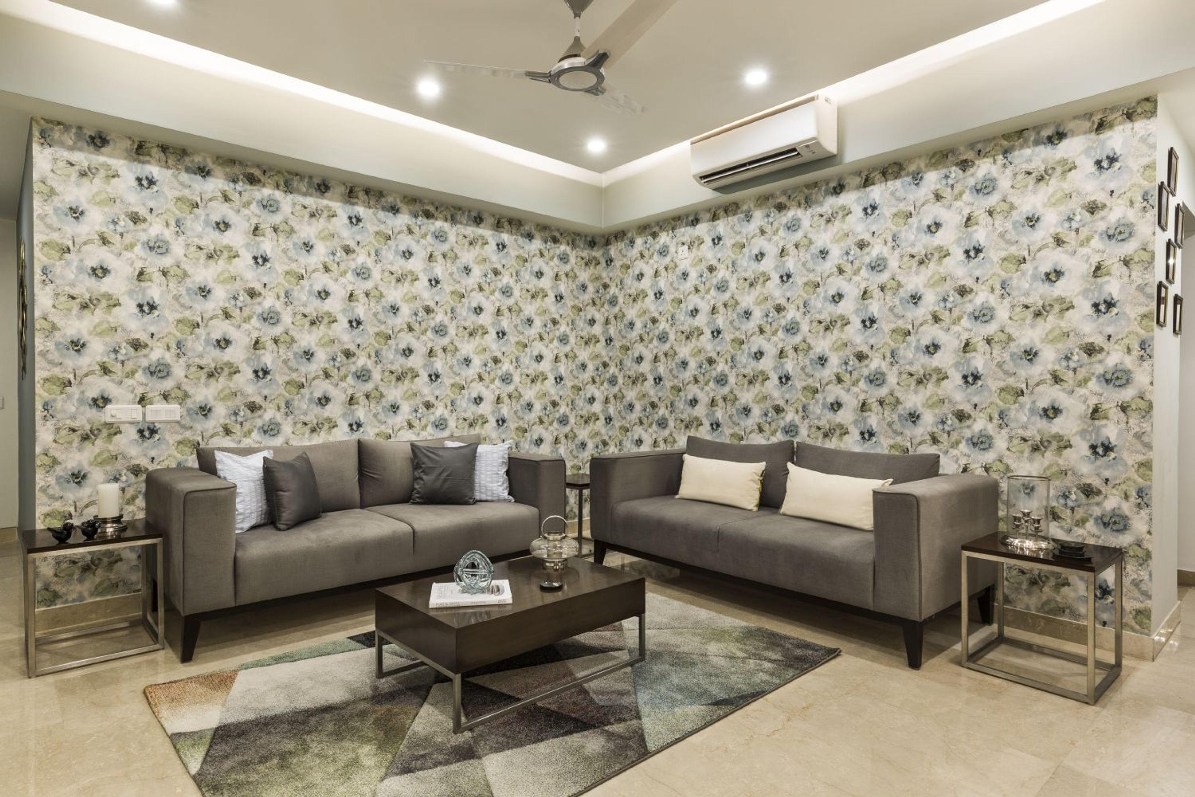 Living Room Design with Floral Wallpaper and Grey Sofas