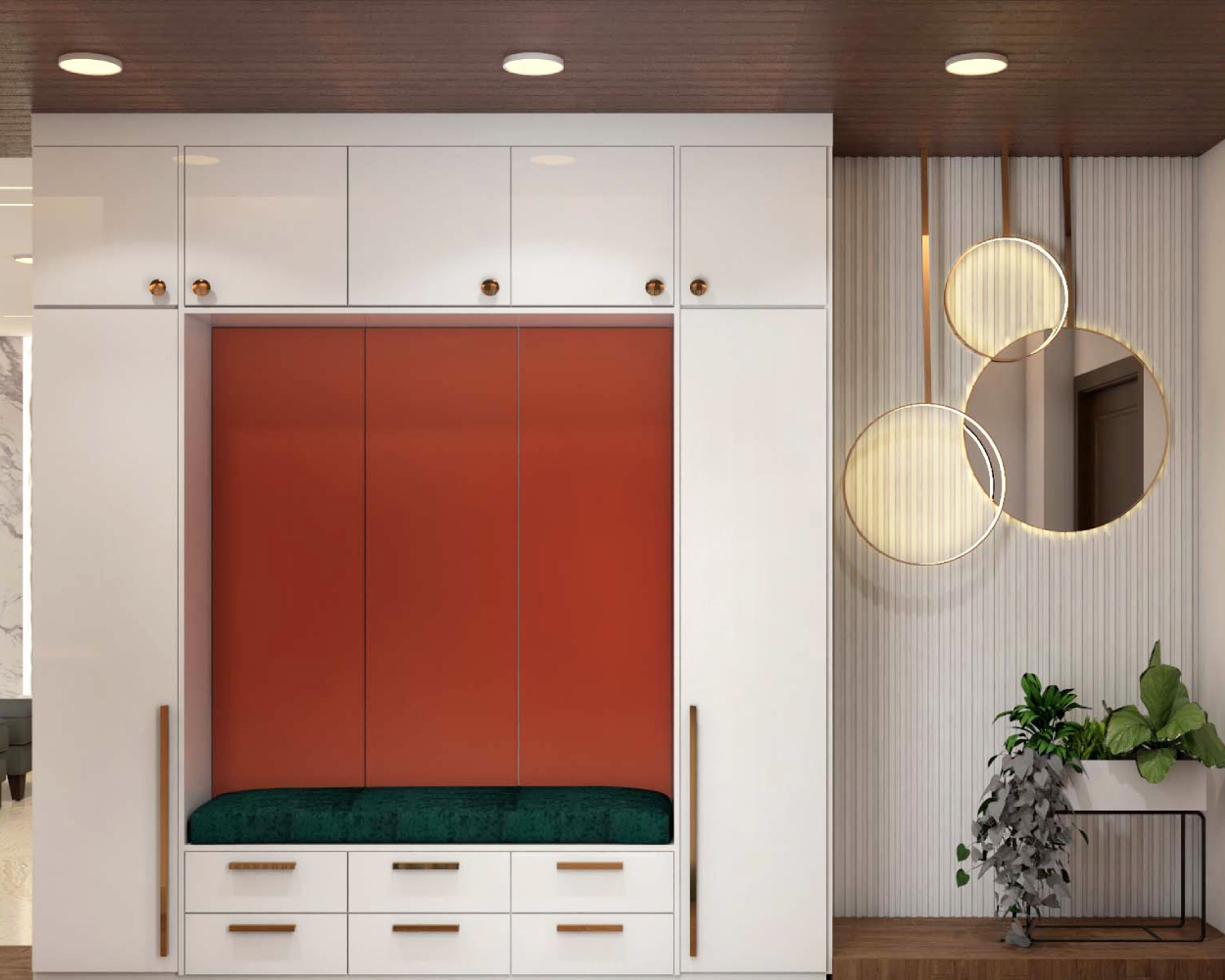 Multicoloured Foyer Design With White Storage Unit, Orange Accent Wall And Green Velvet Niche Seater - Livspace