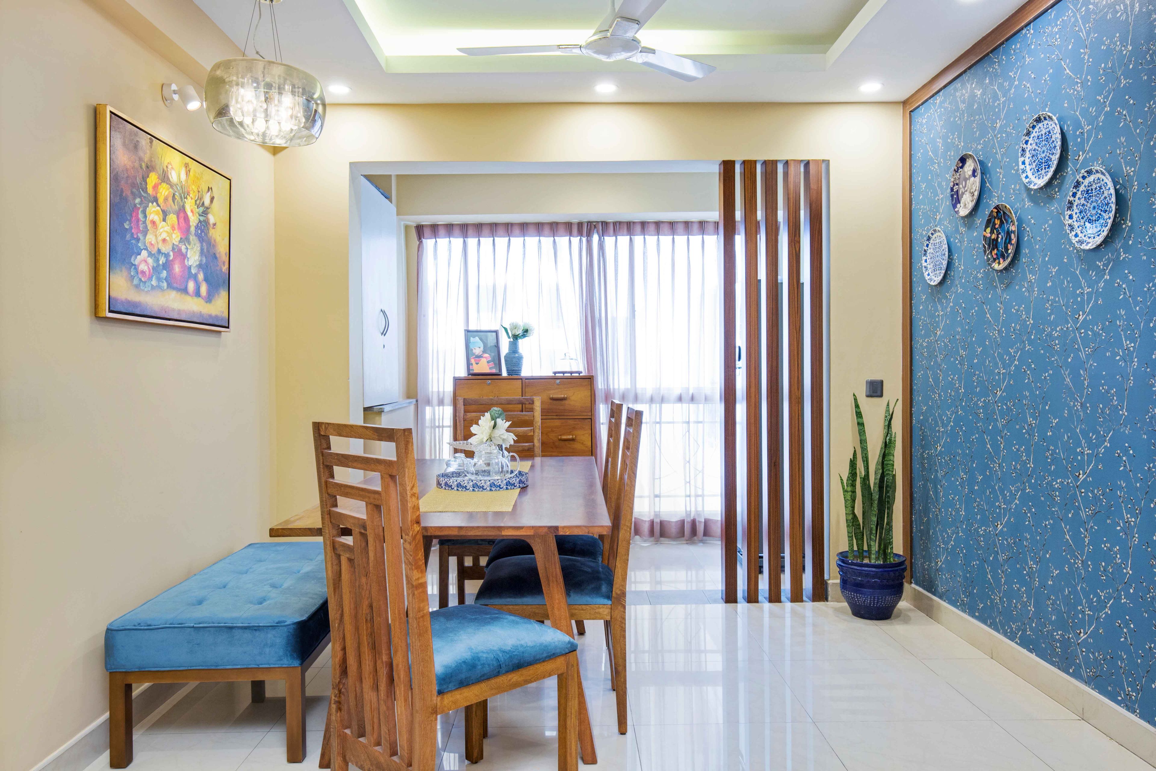 Contemporary 4-Seater Wood And Blue Dining Room Design With Blue Floral Wallpaper