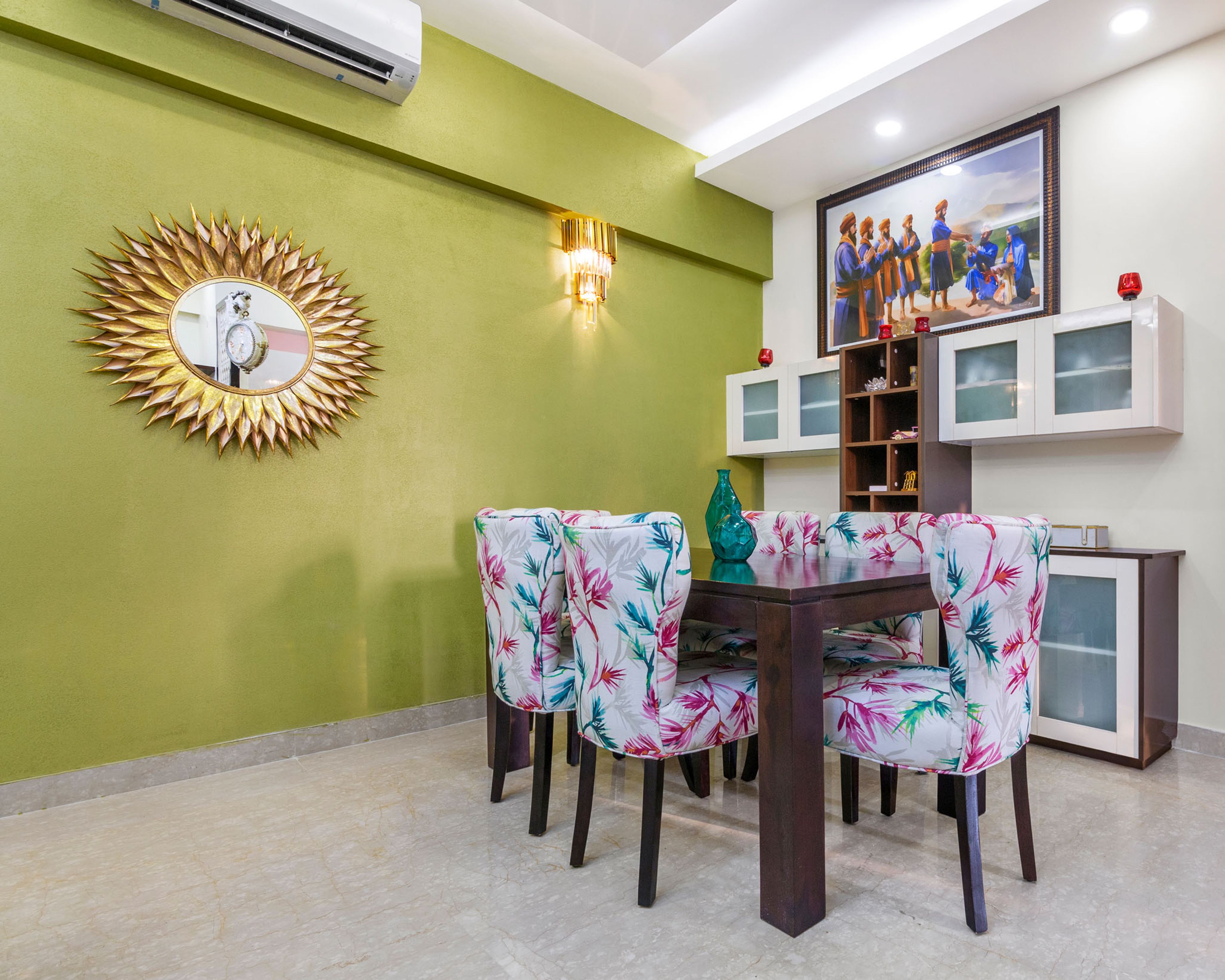 Compact 6-Seater Wood And Multicoloured Patterned Dining Room Design With Green Accent Wall - Livspace