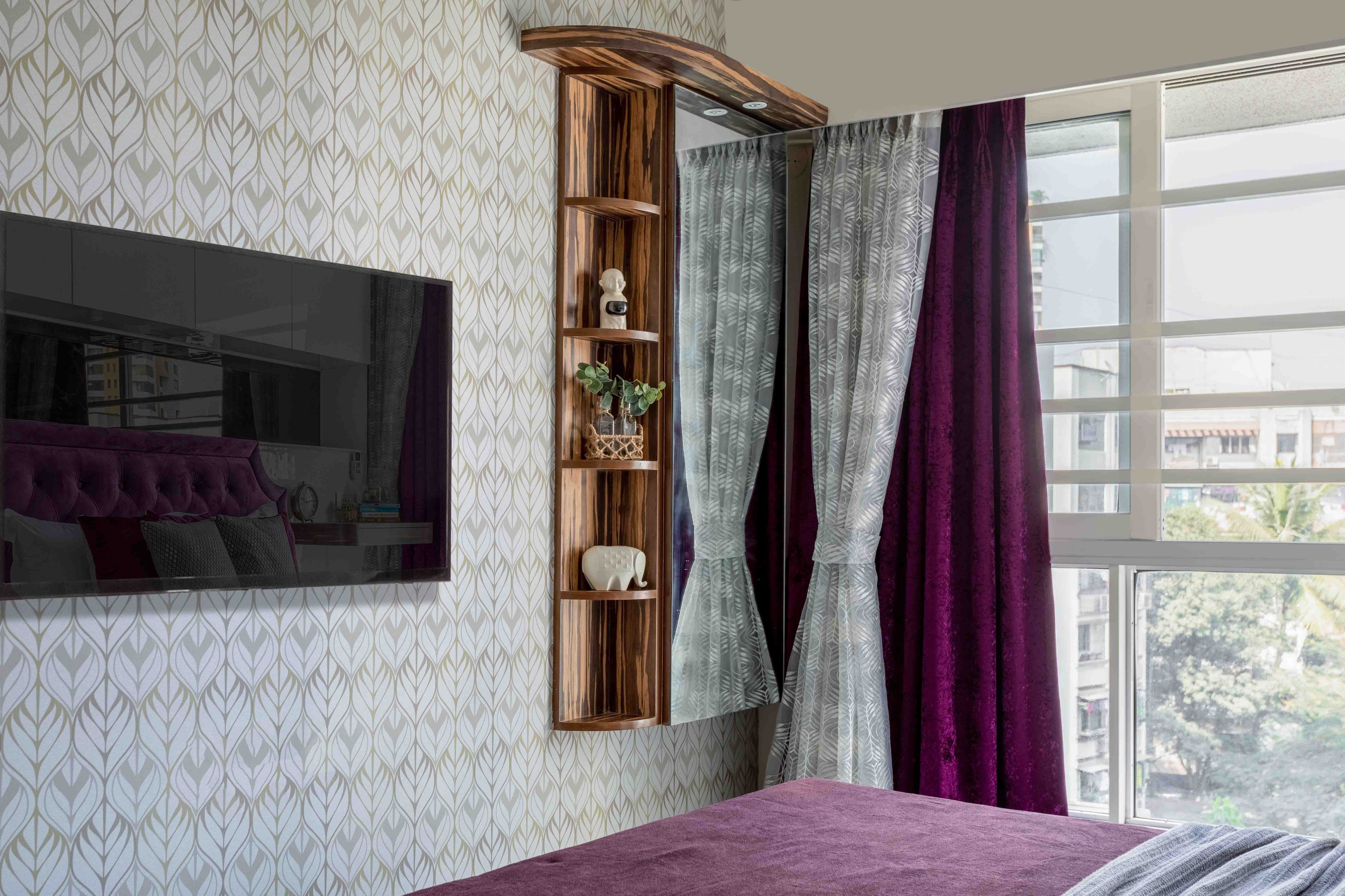 Modern Master Bedroom Design with Purple Headboard, Sliding Wardrobe, and Wall-Mounted Shelves - Livspace