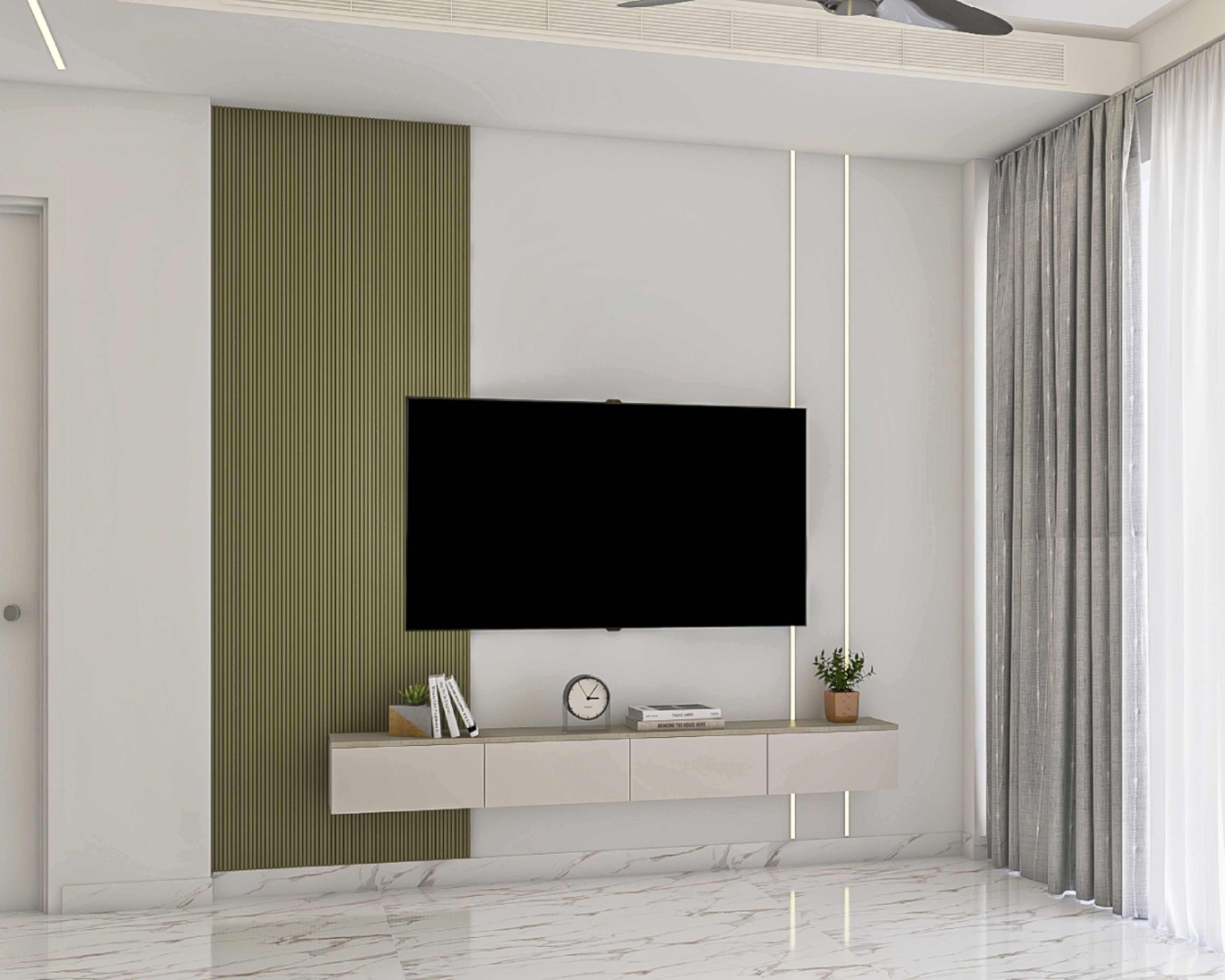 Frosty white TV unit design with wall-mounted drawer and green fluted wall panels - Livspace