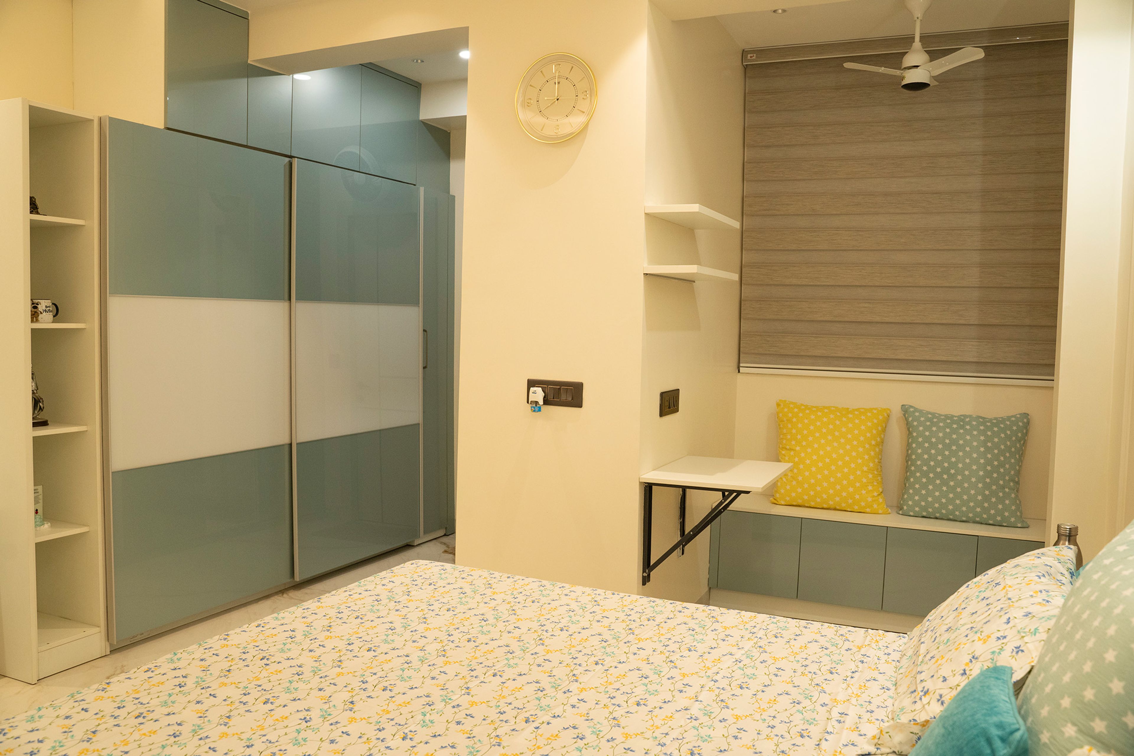 Modern Master Bedroom Design with Teal Platform Bed and Study Nook