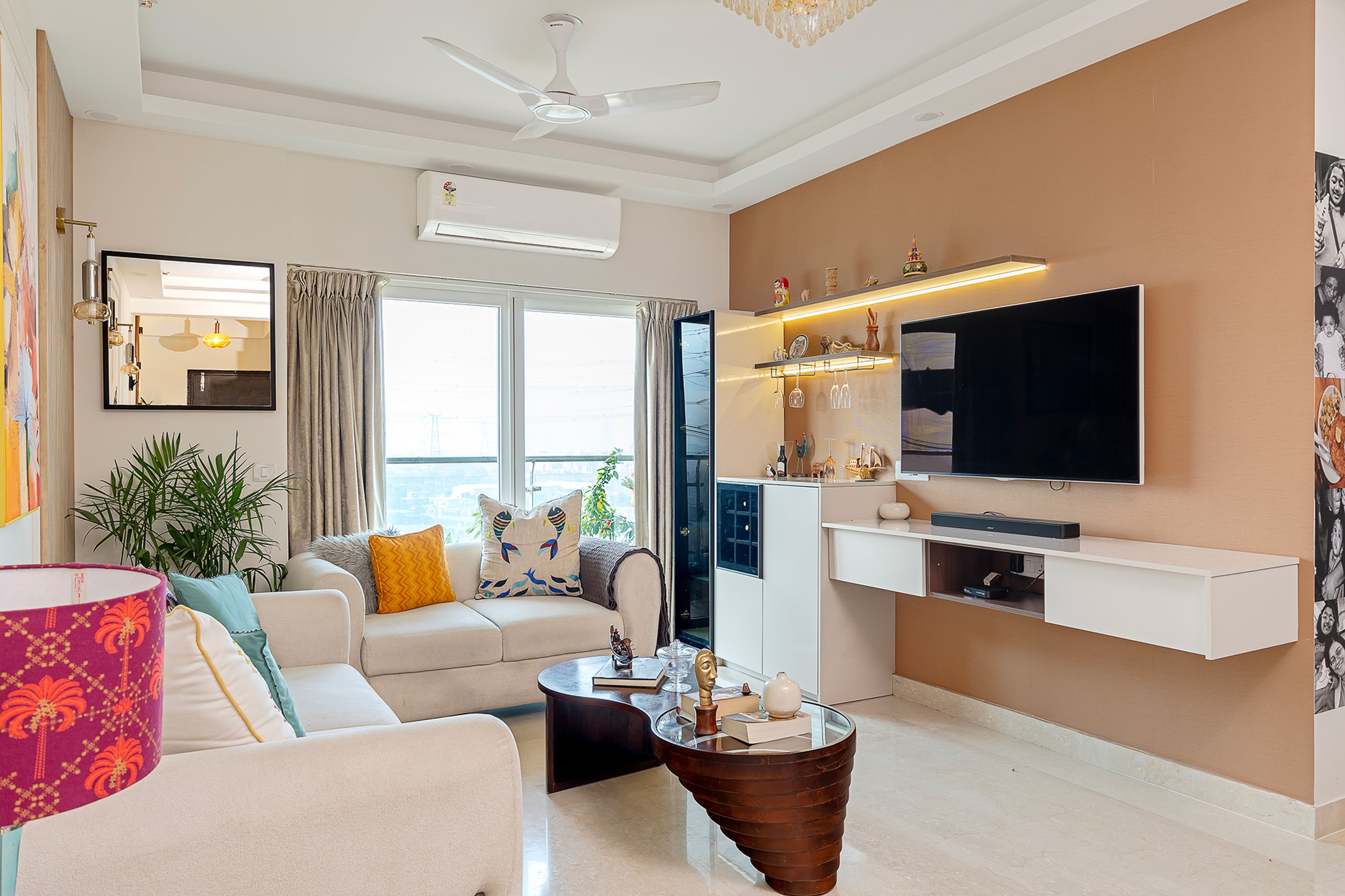 Modern Peach Wall Paint Design Featuring Floating TV Unit for Living and Bedrooms