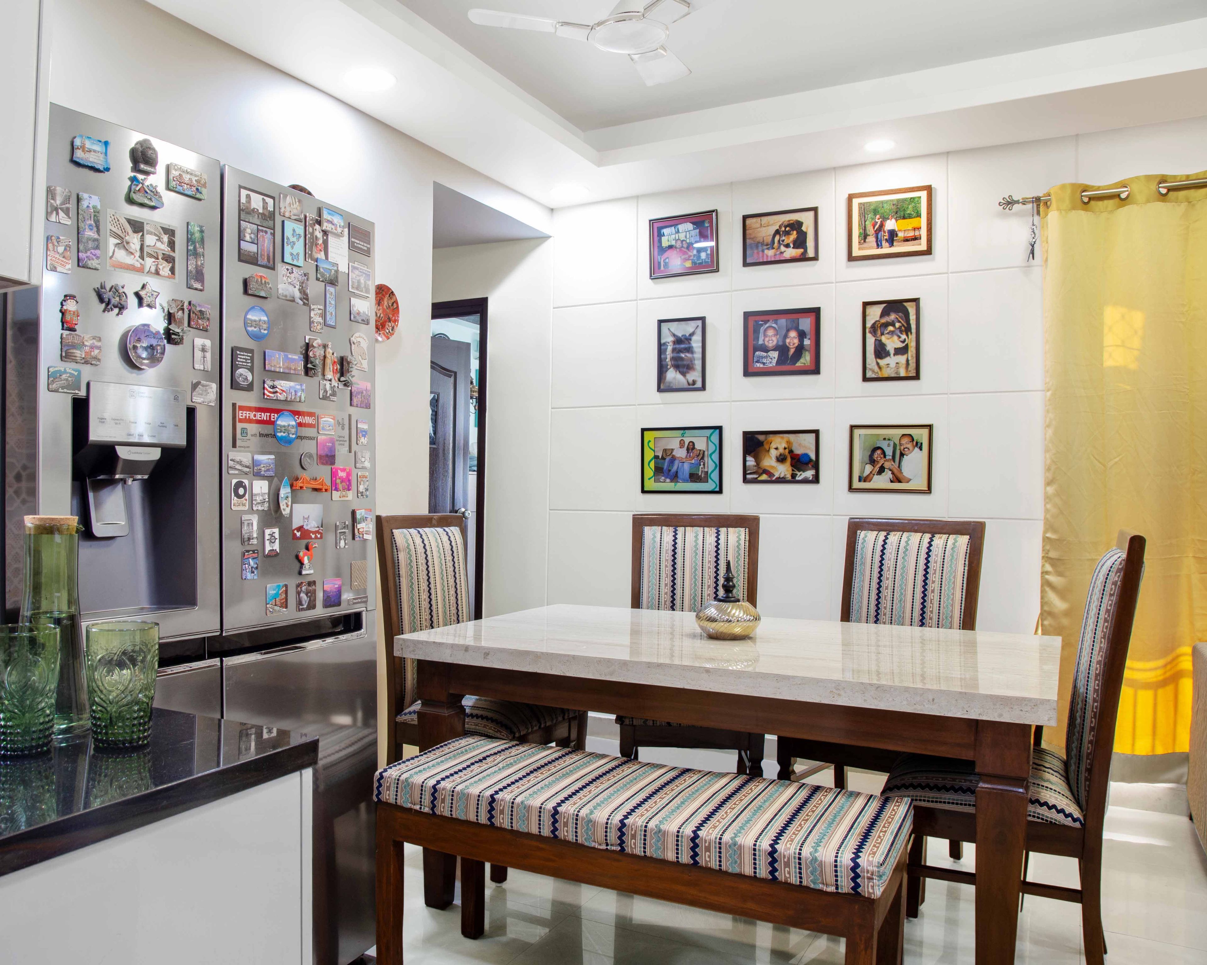 Contemporay Marble 4-Seater Dining Room Design With Seater And Multicoloured Cushions