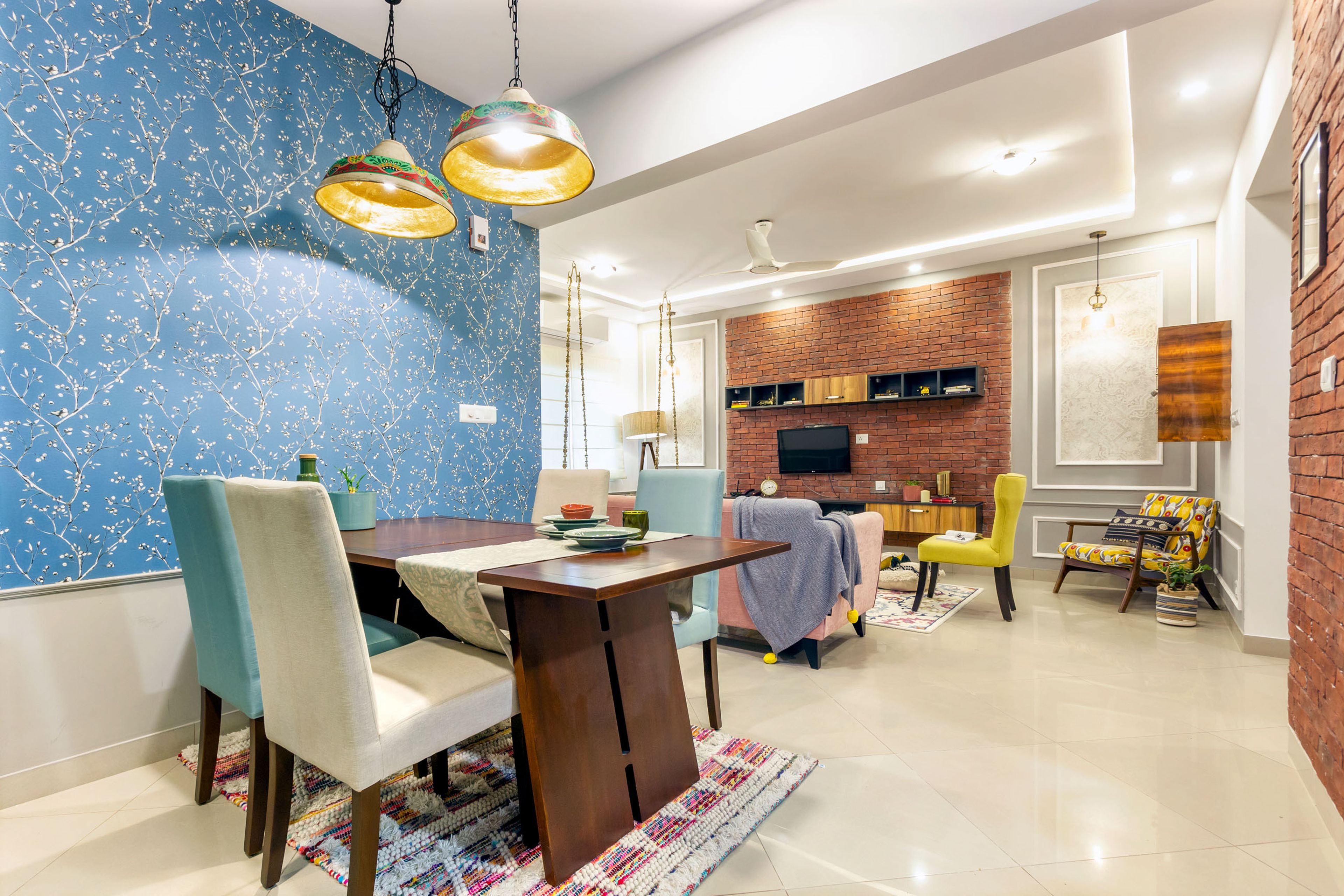 7x9 Ft Wooden 4-Seater Dining Room Design With Blue Floral Wallpaper - Livspace