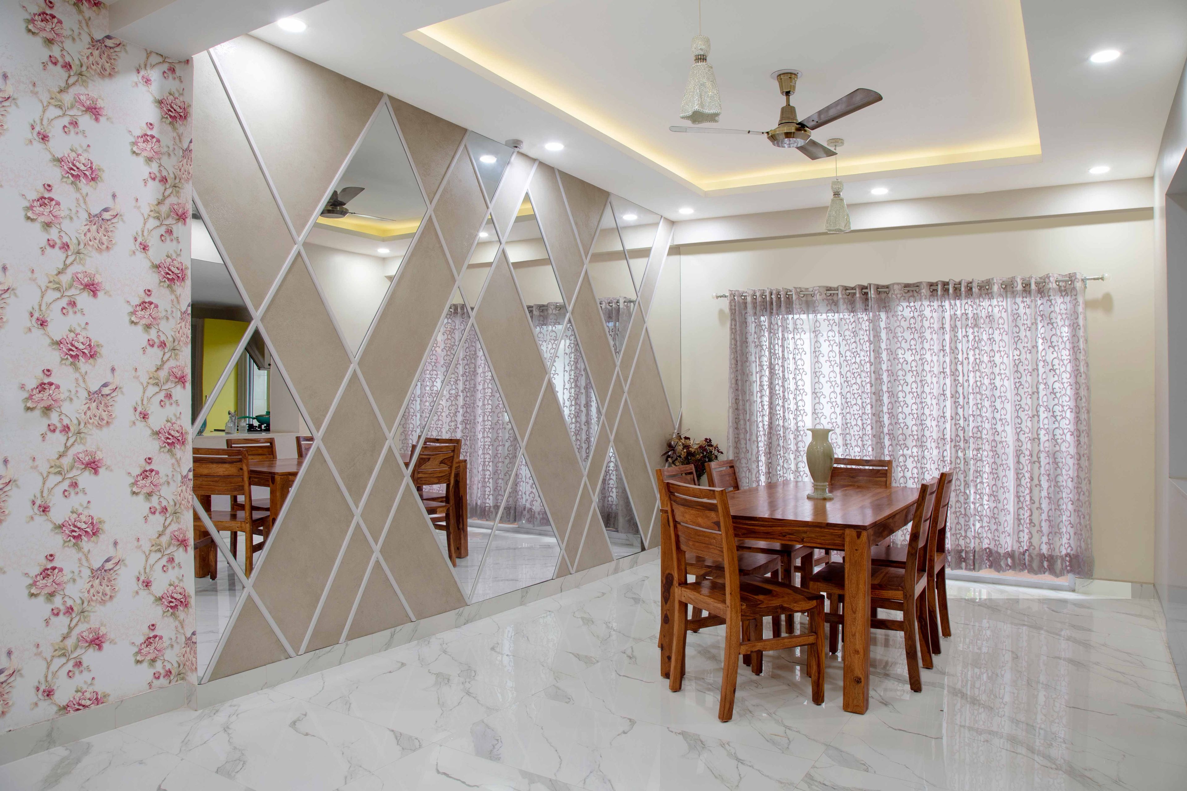 Contemporary Wooden 6-Seater Dining Room Design With Mirror Panelled Wall And Floral Wallpaper