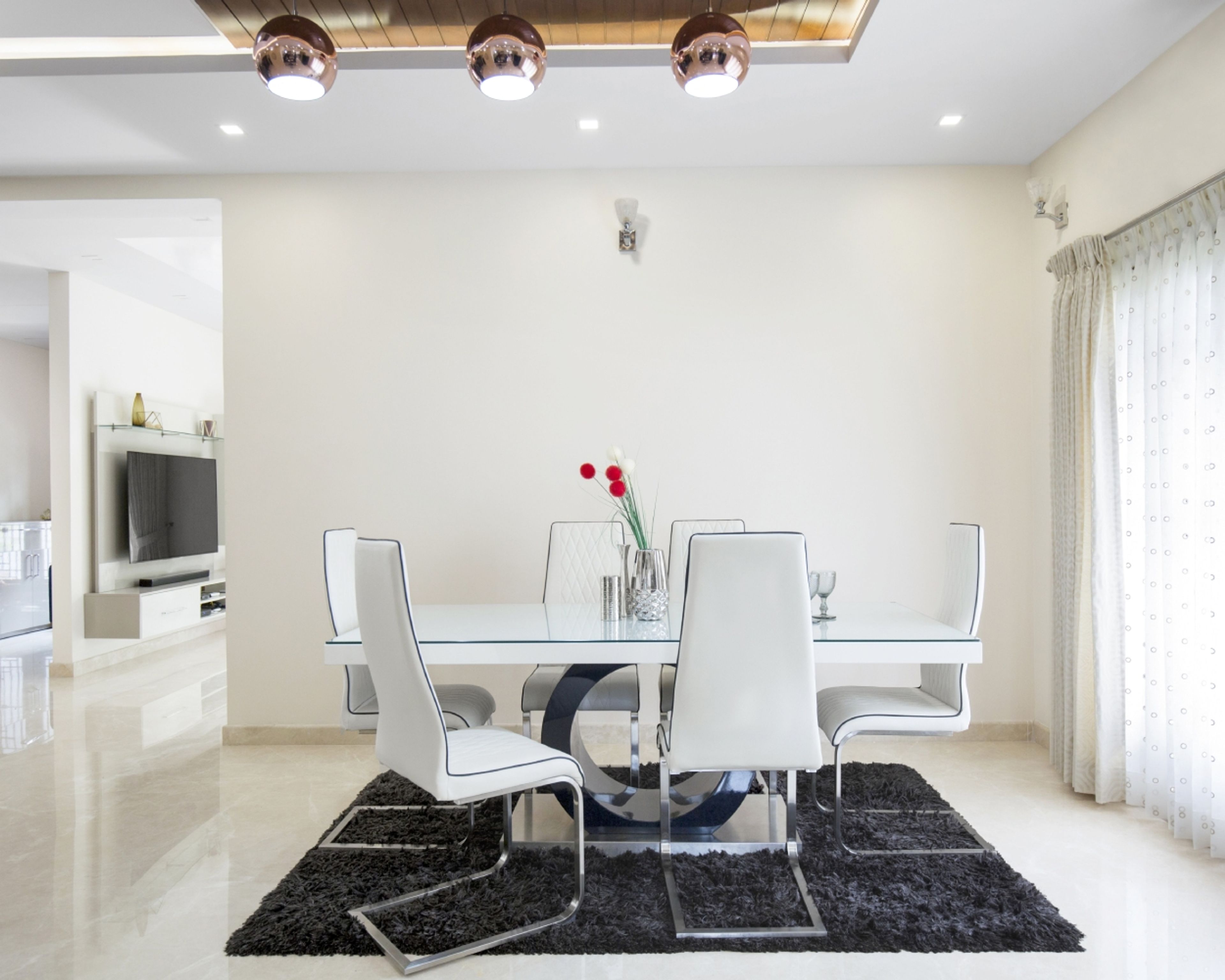 11x10 Ft All-White 6-Seater Dining Room Design With Wooden False Ceiling - Livspace