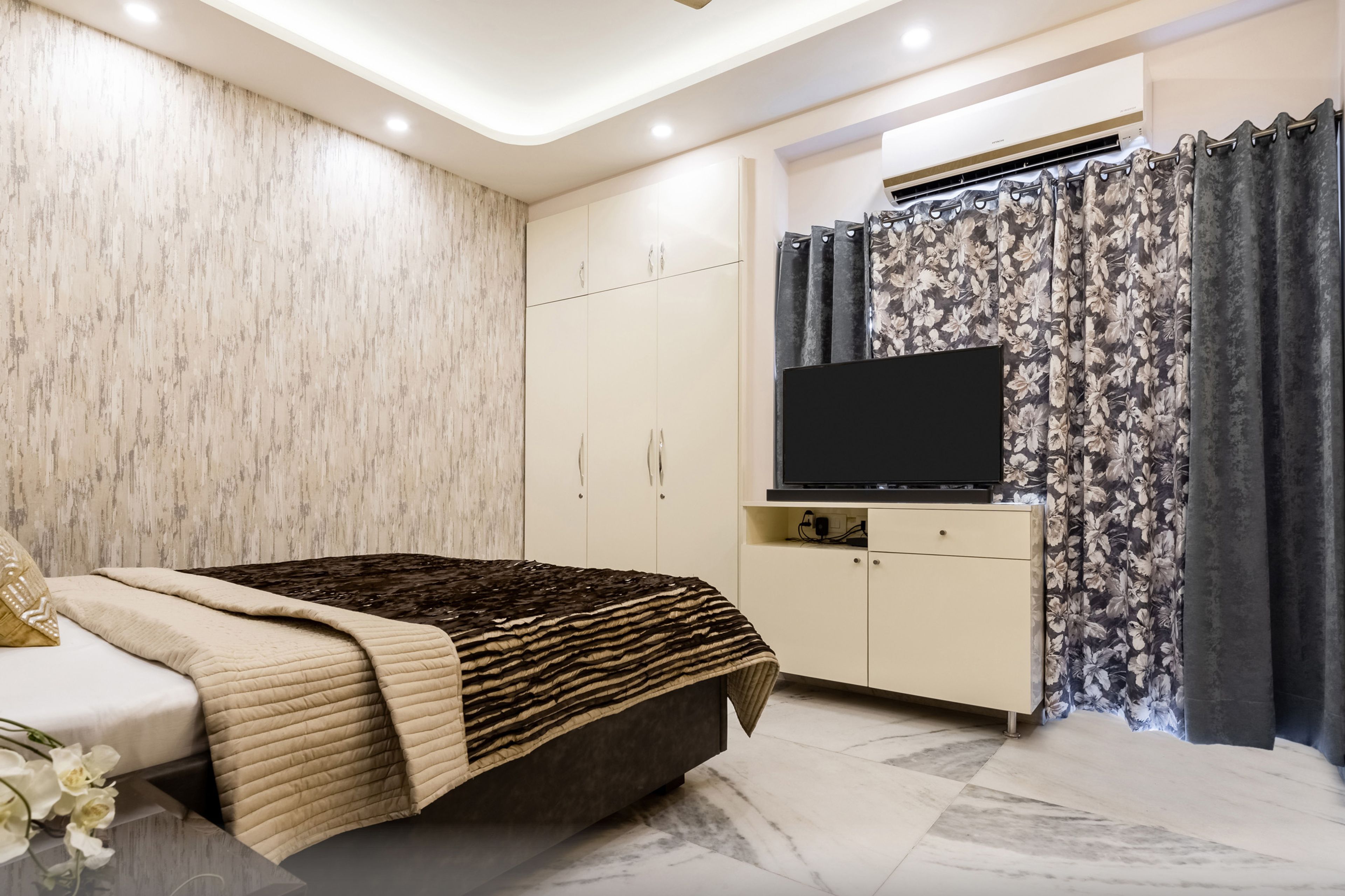Master Bedroom Design With Cream Wardrobe - Livspace