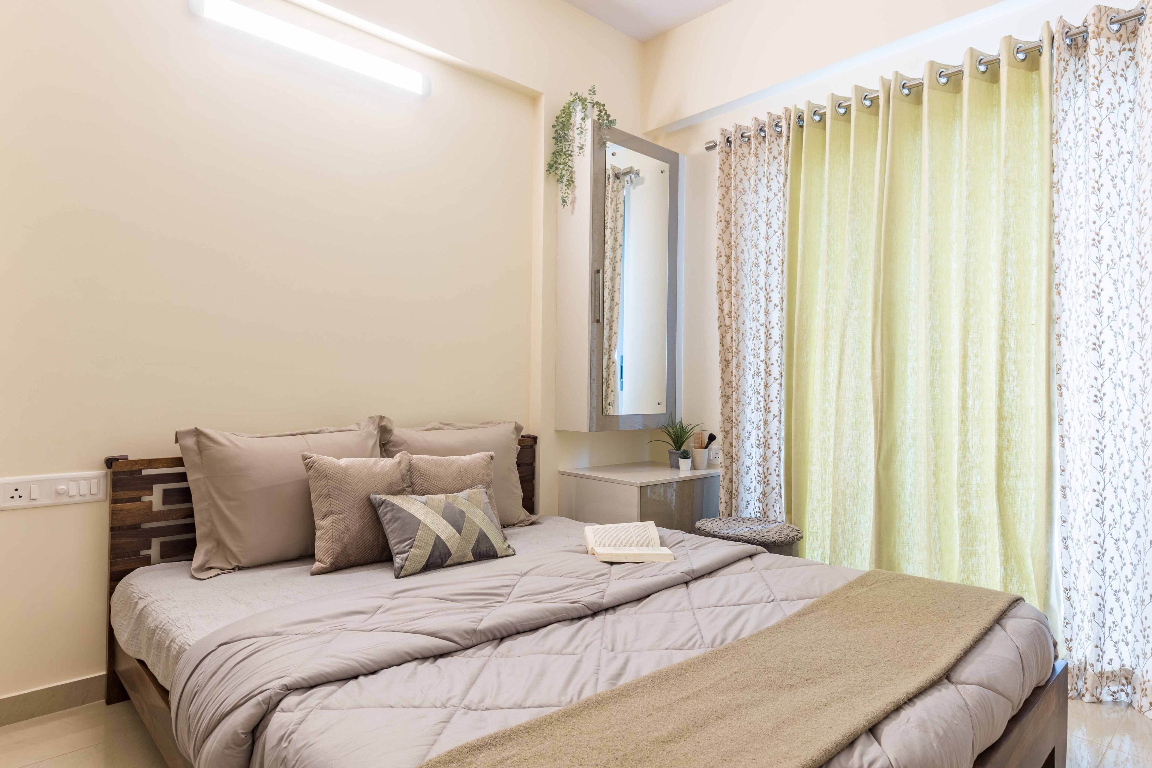 Beige Master Bedroom Design With Wooden Bed- Livspace