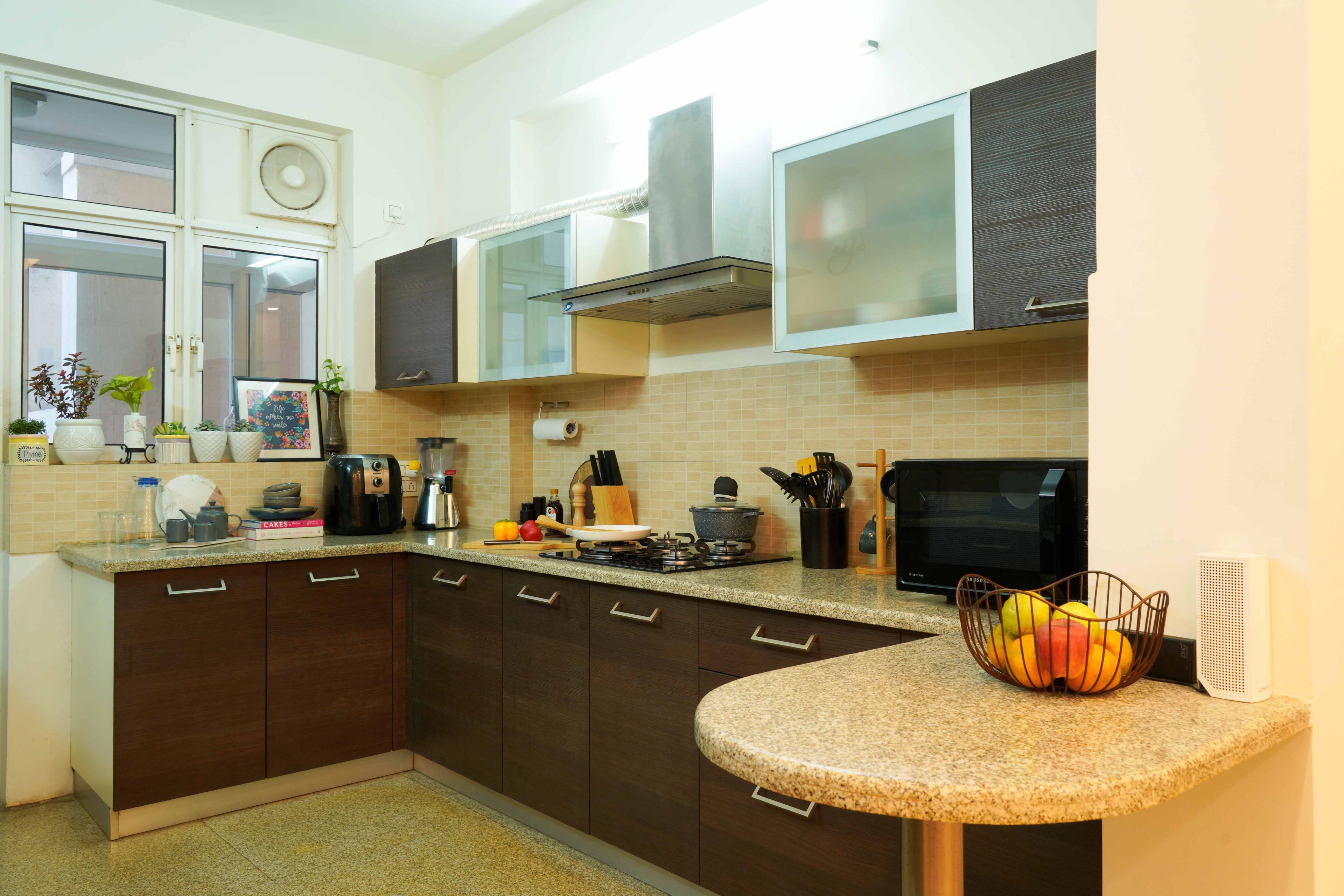 L-Shaped Kitchen Design With Brown And Frosted White Cabinets - Livspace