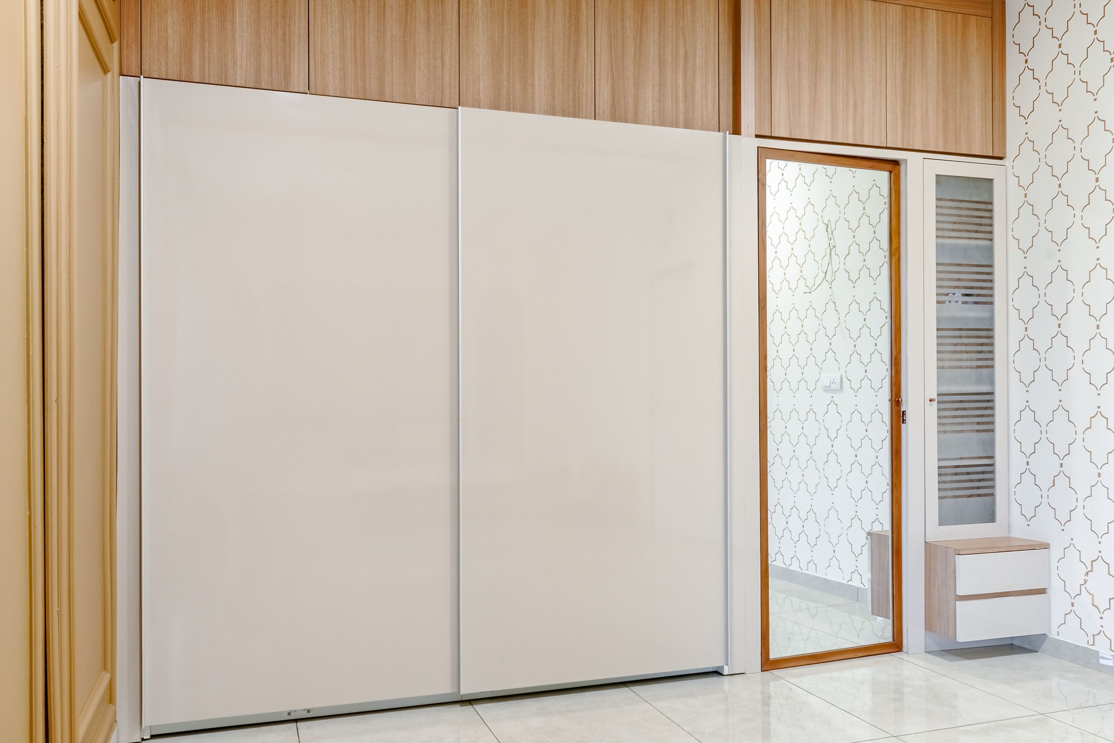 White And Wood Sliding Wardrobe Design With Mirror - Livspace