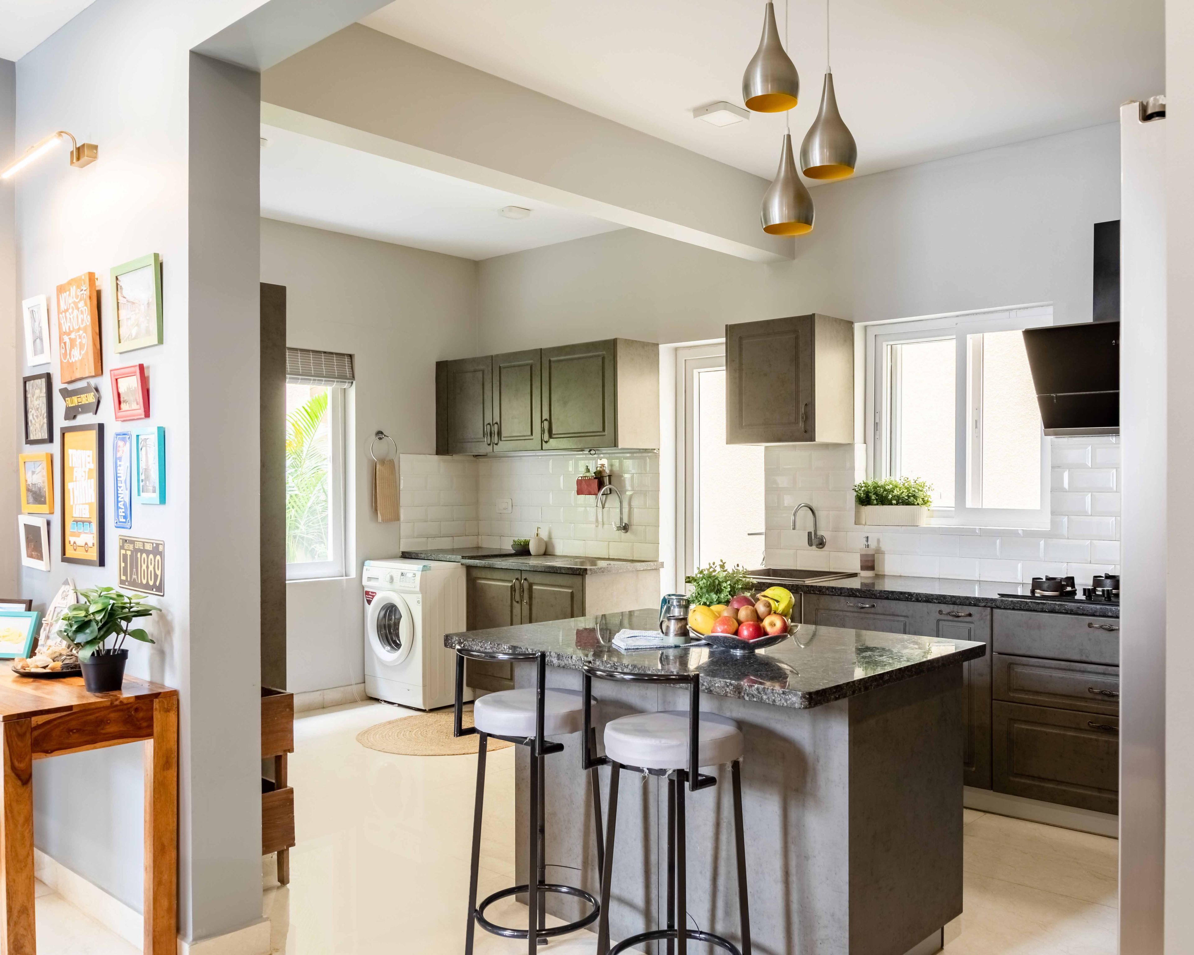Spacious Grey Kitchen Design With Kitchen Island And Pendant Lights - Livspace