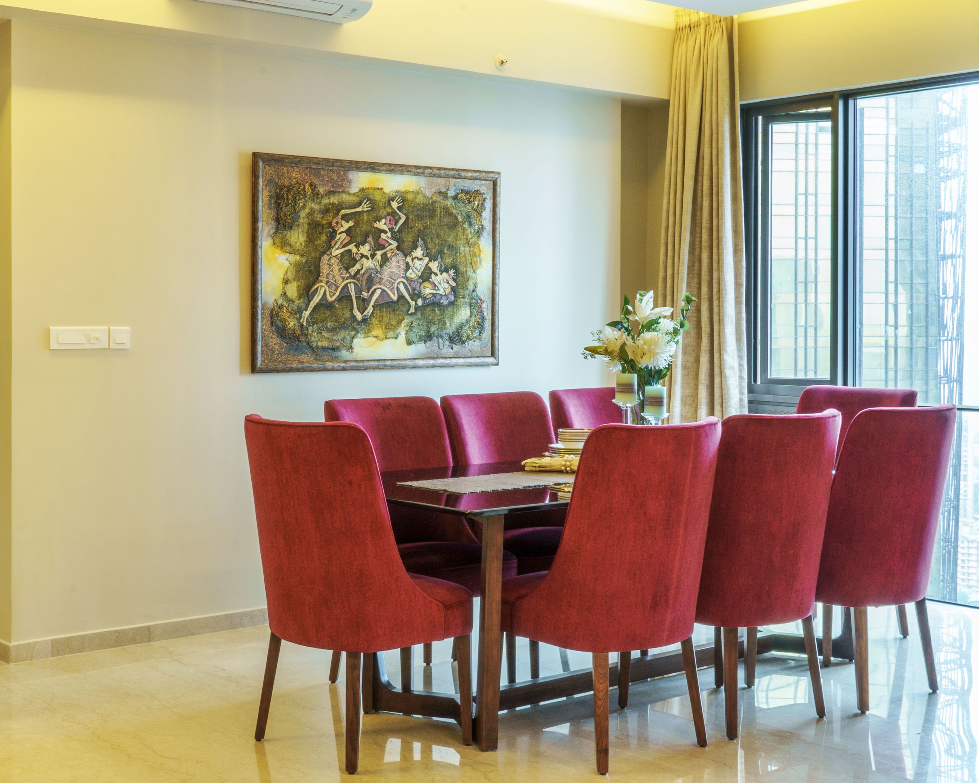 8-Seater Dining Room Design With Upholstered Chairs - Livspace