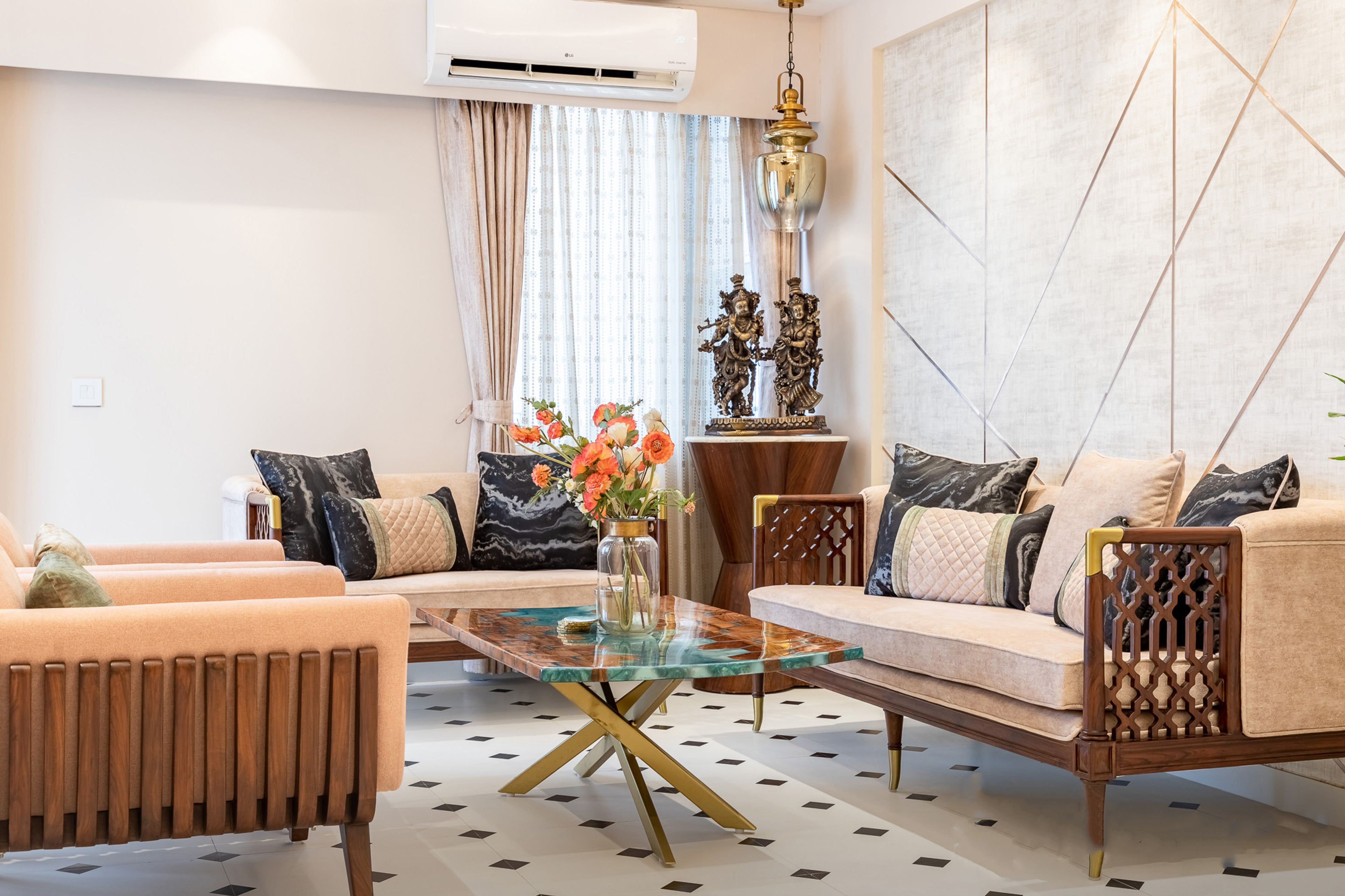 Spacious Living Room Design With Peach Upholstery - Livspace