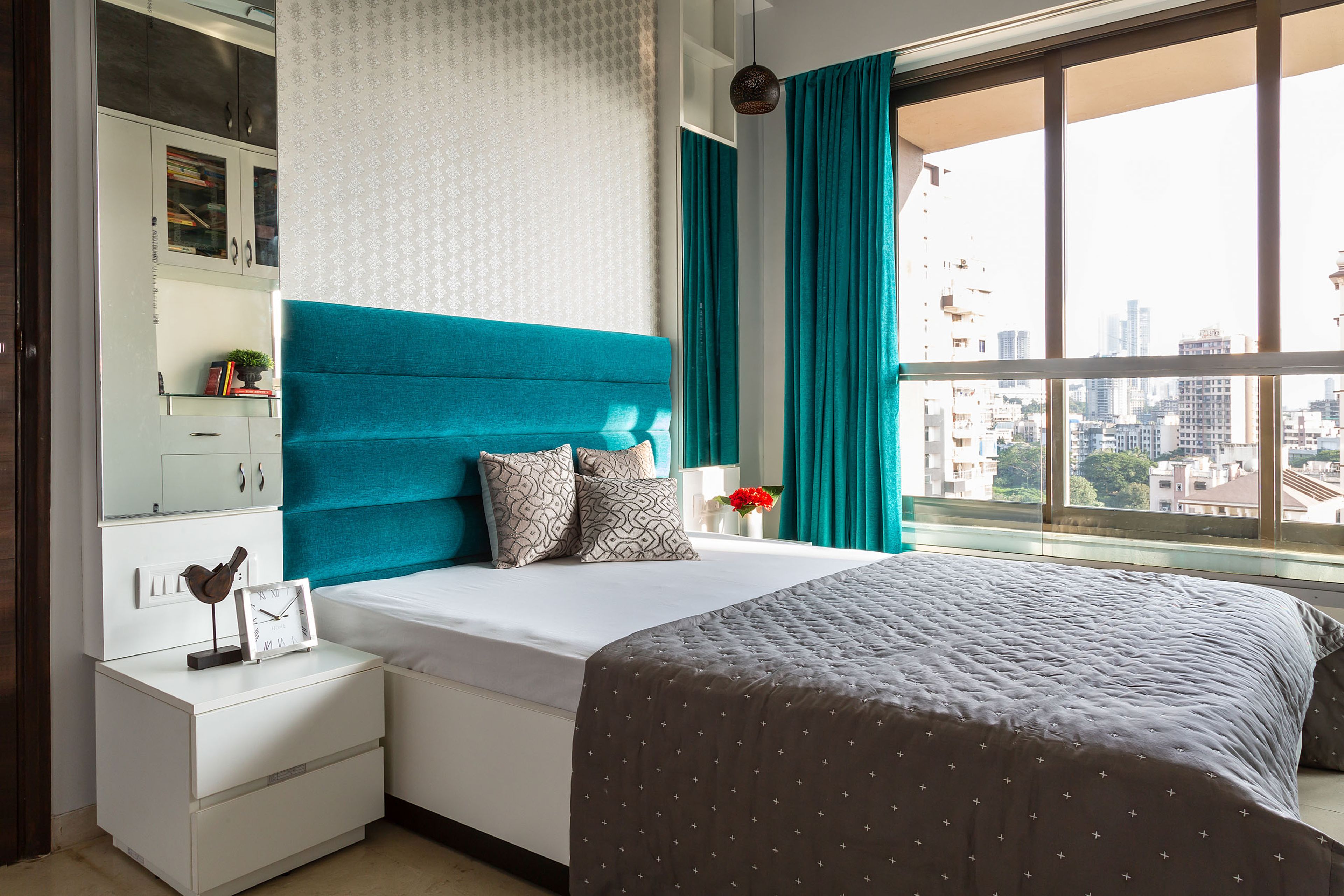 Master Bedroom With Blue Tufted Headboard - Livspace