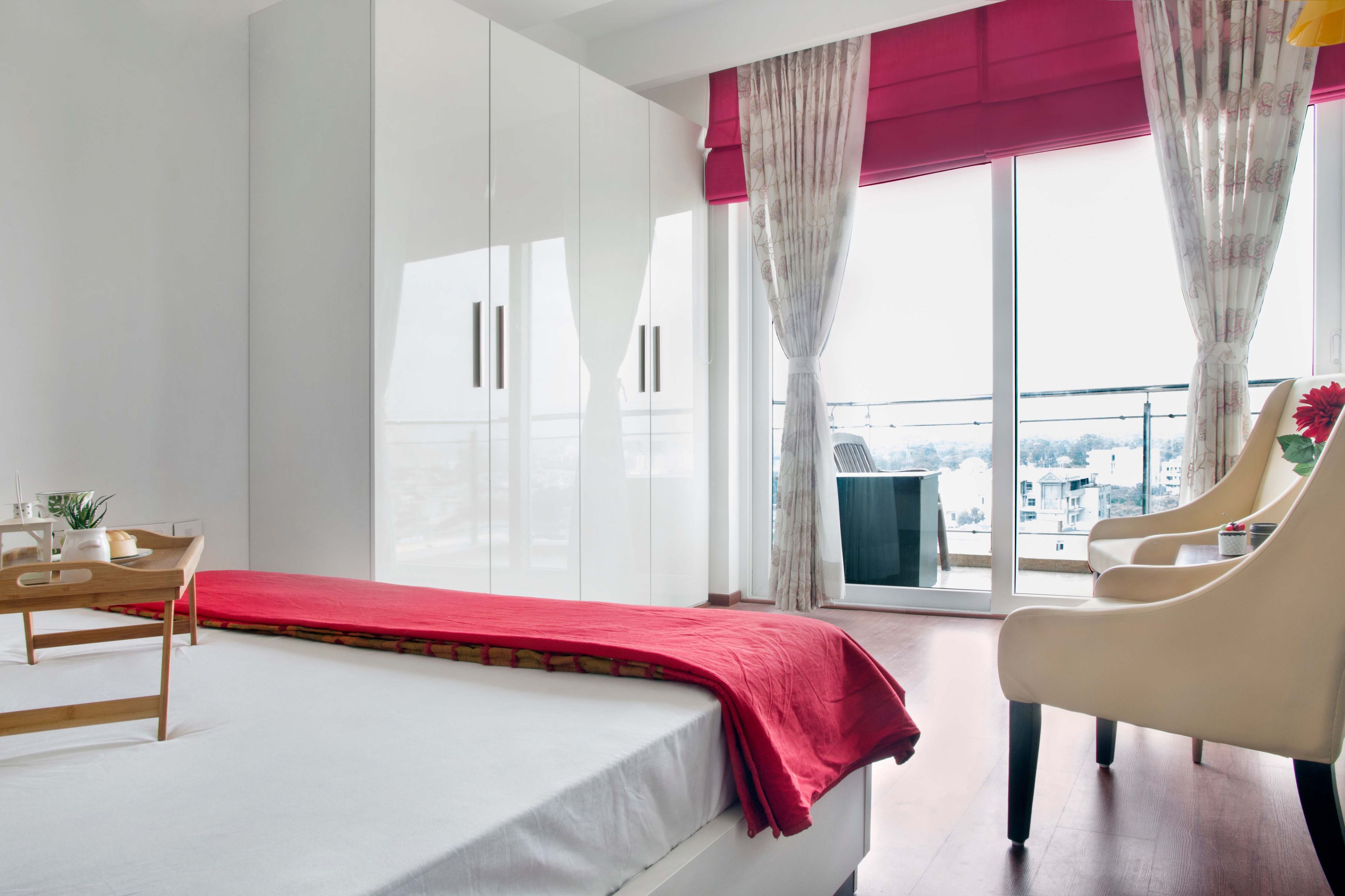 White Glossy Swing Wardrobe Design - Livspace