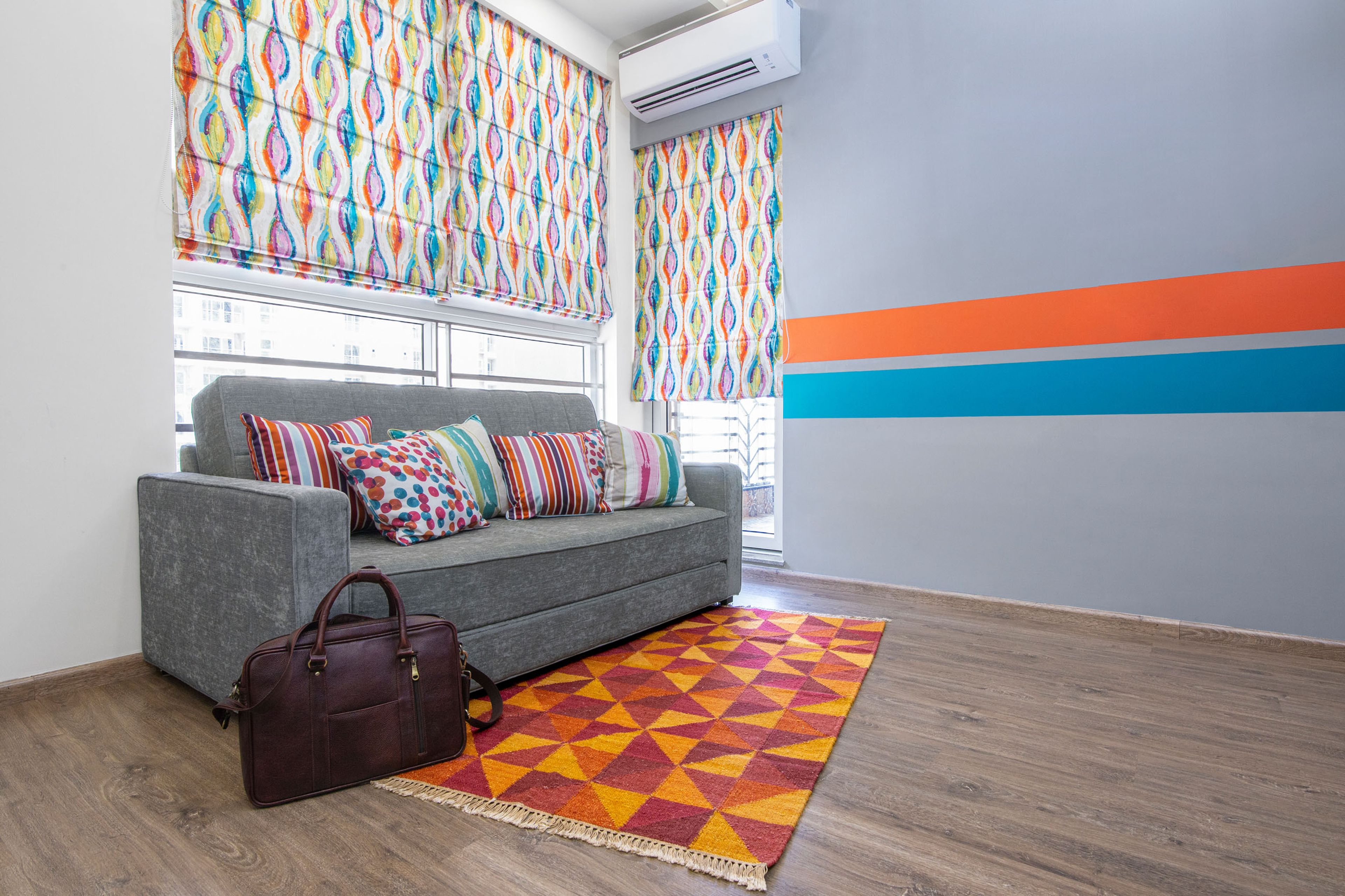 Home Office Design With Grey Accent Wall And Dual-Toned Stripes - Livspace