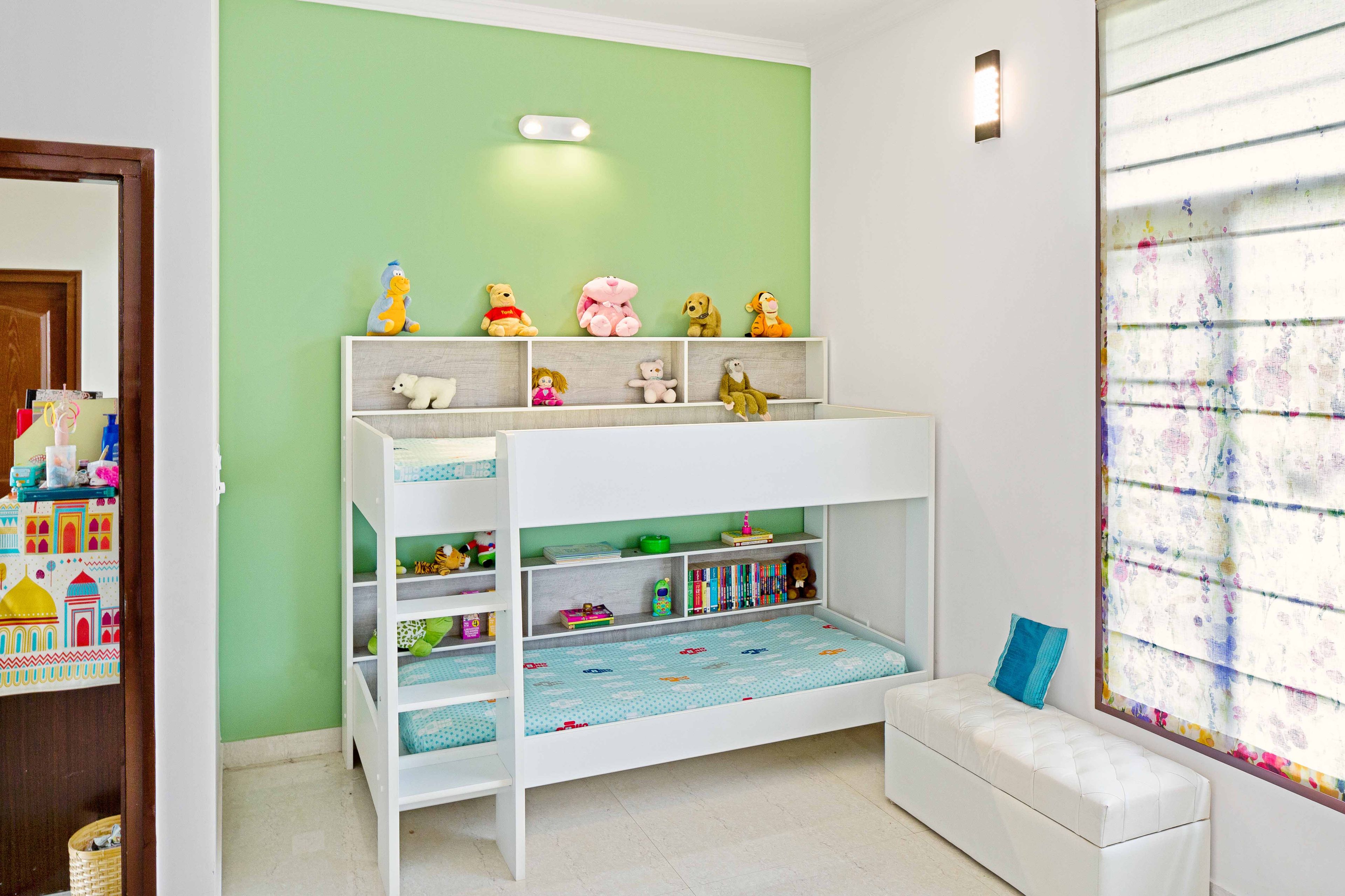 Kid's Bedroom Design With Green Accent Wall And White Bunk Bed - Livspace